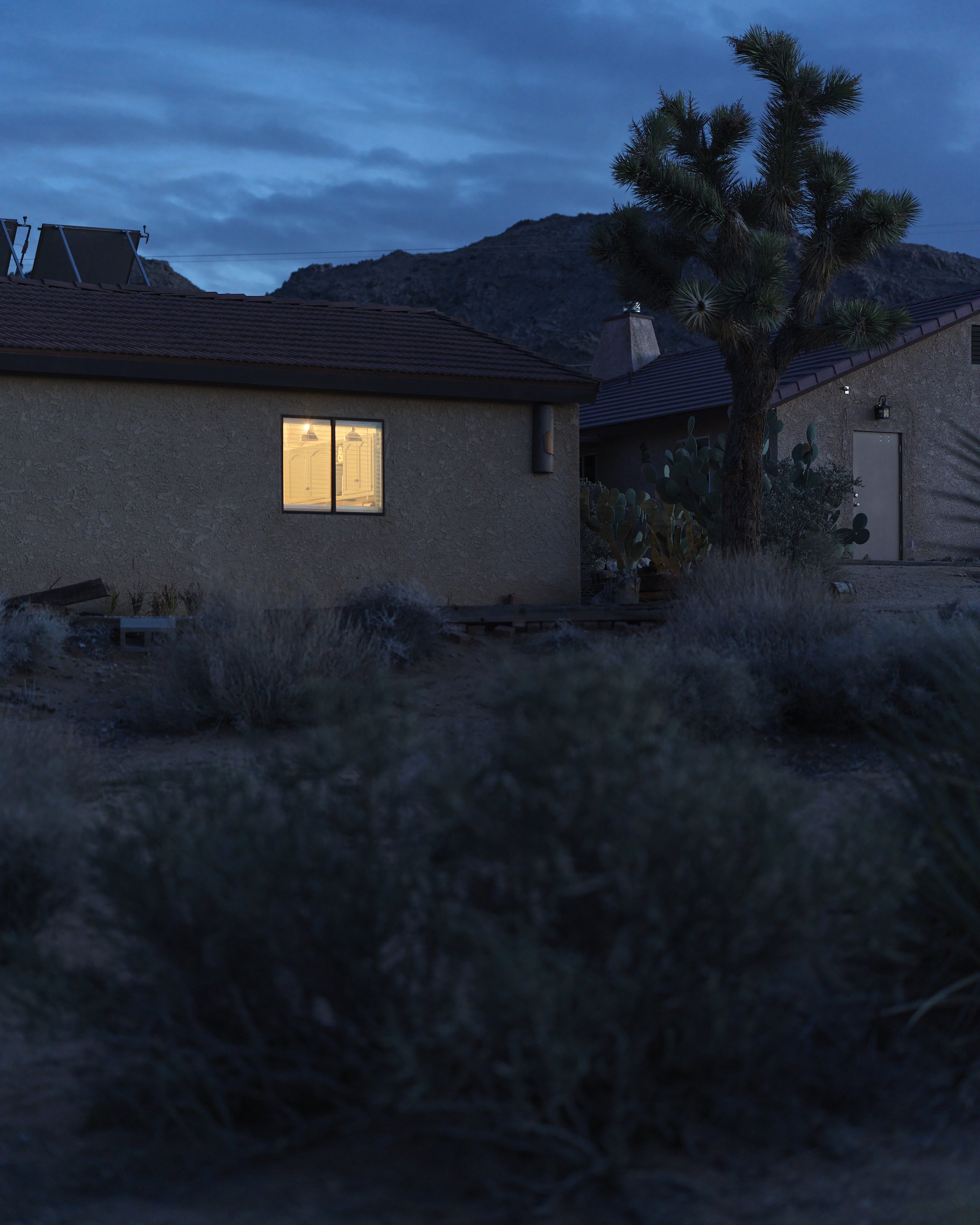 A House with a Light Left on at Dusk.jpg