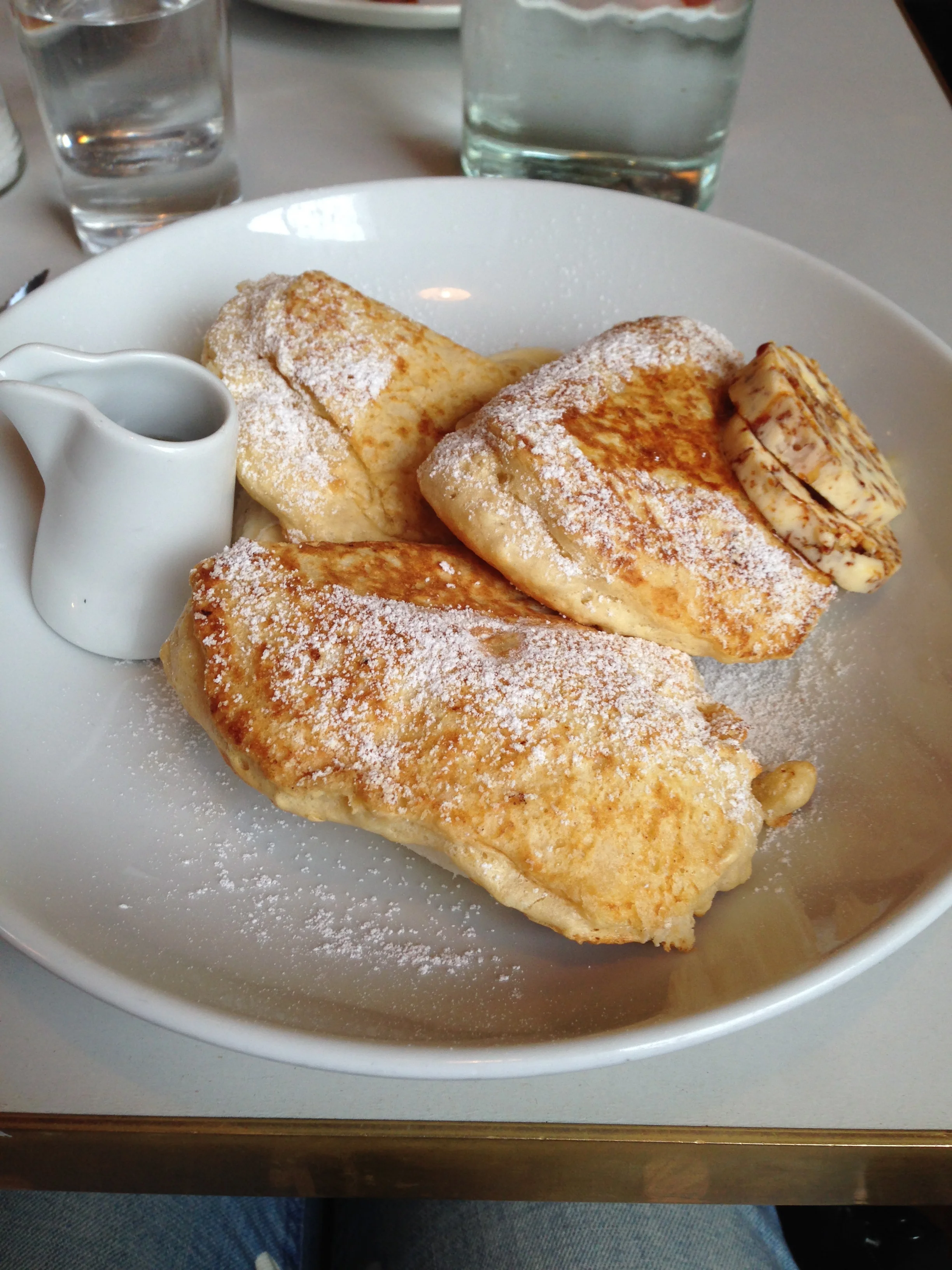 Ricotta Hotcakes with Honeycomb Butter at Granger & Co, London.