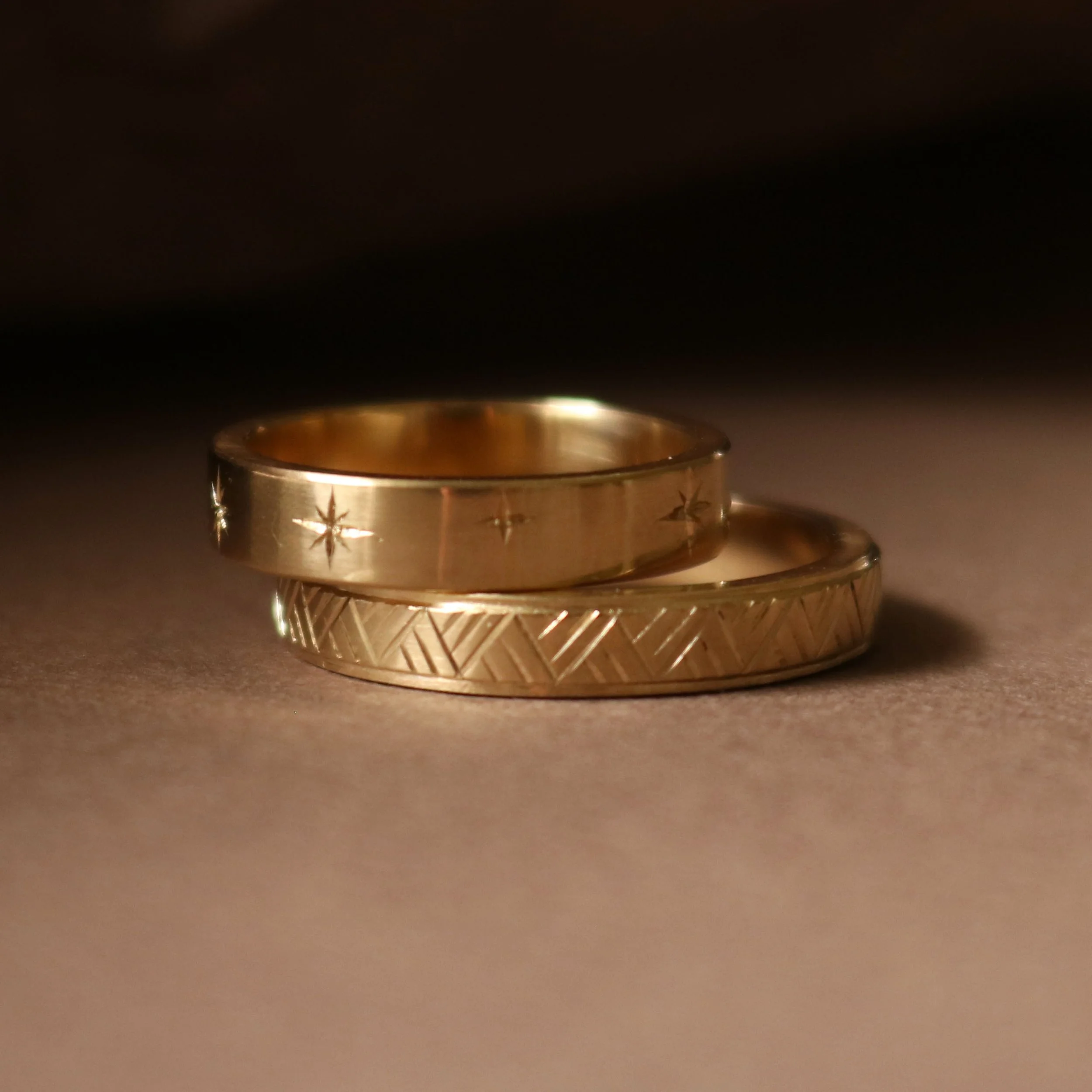Whetu and raranga engraved rings Juno 2026.jpg