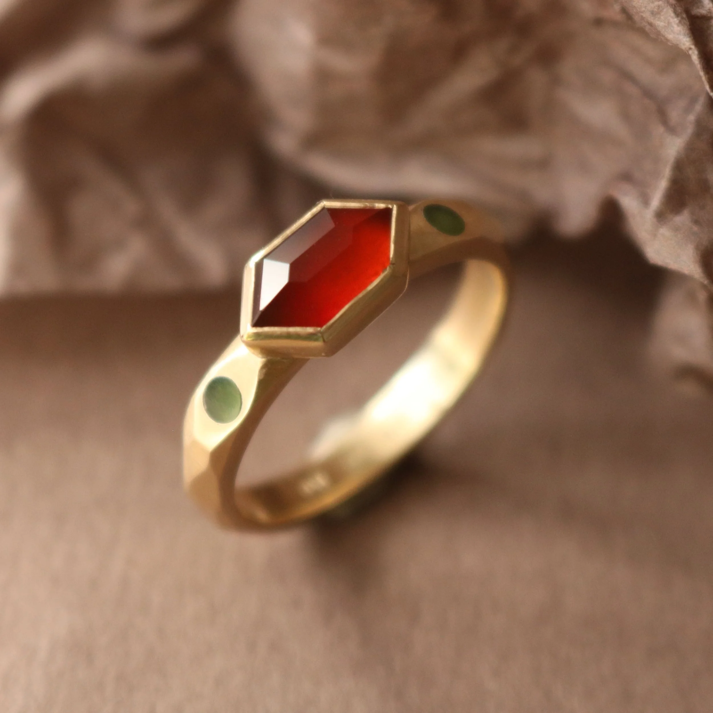 You may have seen the making of this beauty last week on my stories. Here she is, complete and glowing 🌟 
Hand fabricated in 9ct gold with that fiery red Carnelian from the Coromandel region and set with two tiny West Coast Pounamu pieces on the sho
