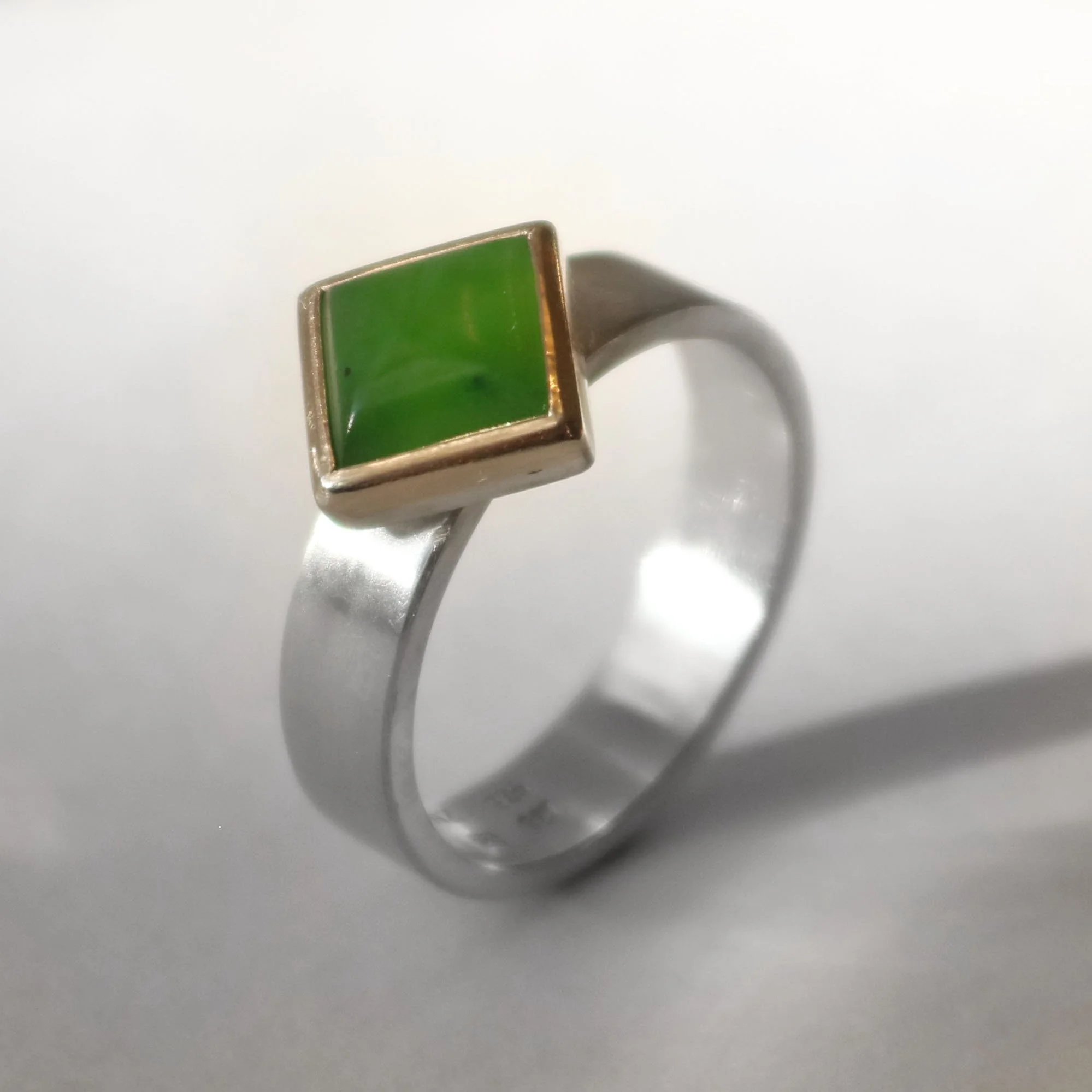 Pounamu and silver diamond ring 2.jpg