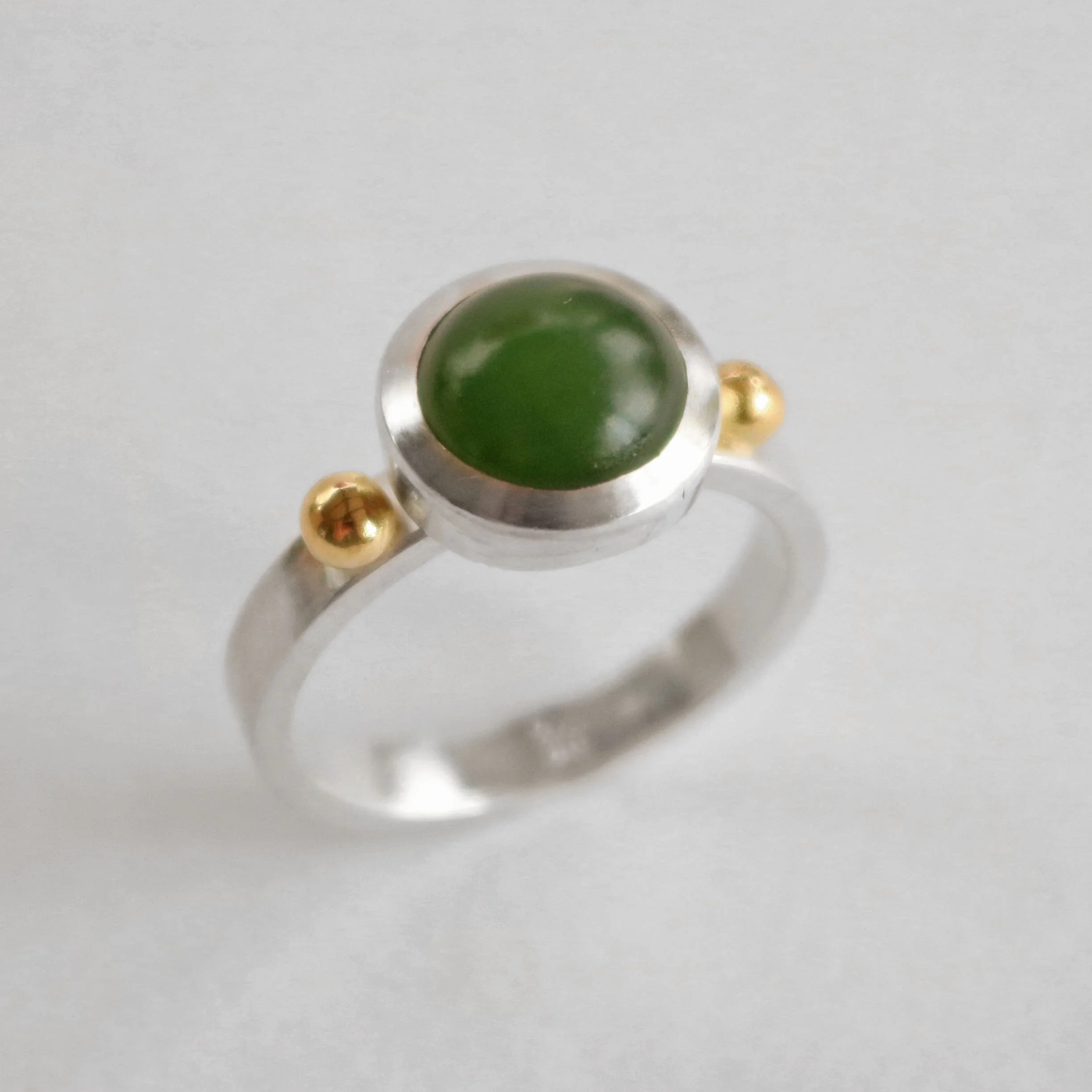 Round pounamu silver 18ct gold ring 3.jpg