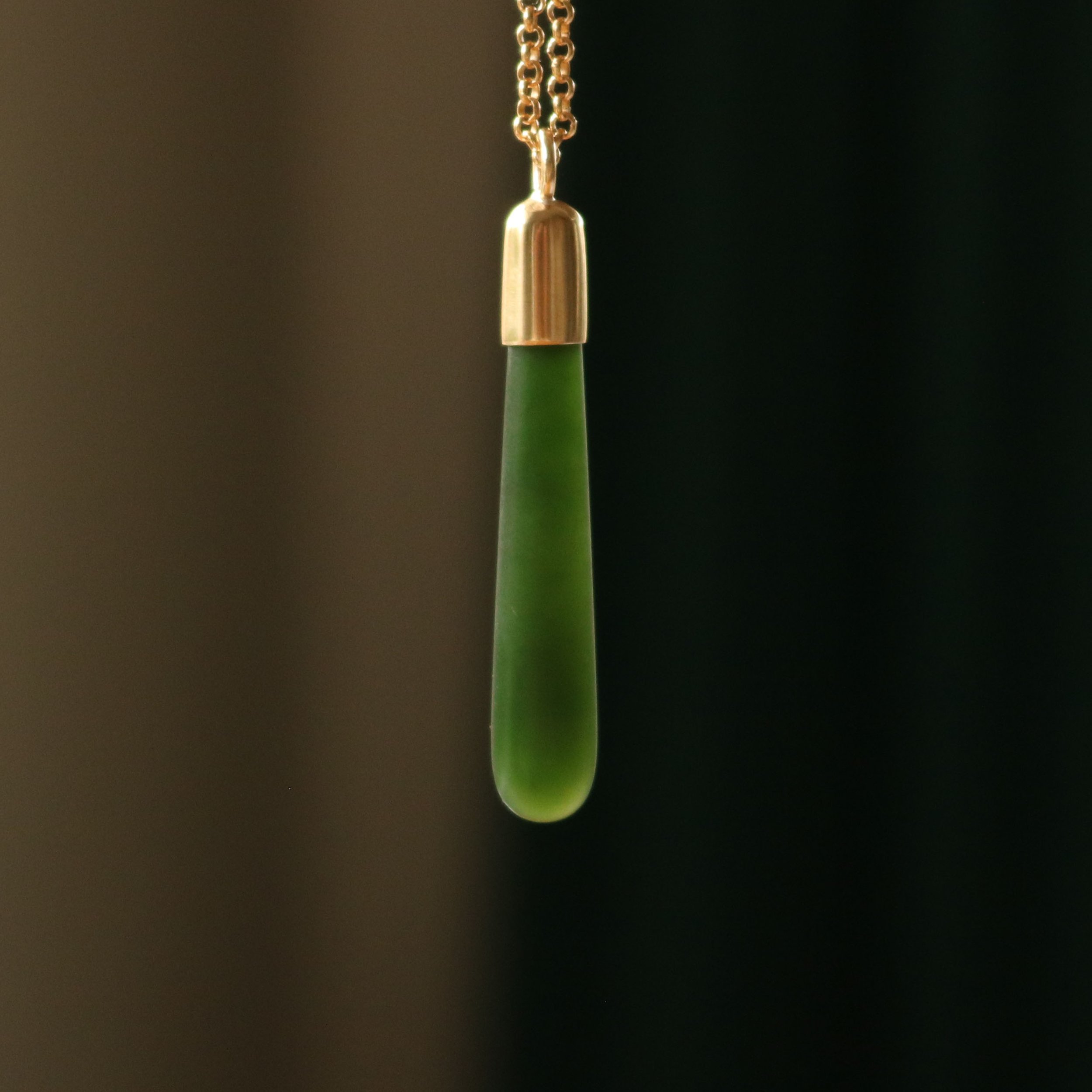Small gold roimata pendant new 2.jpg