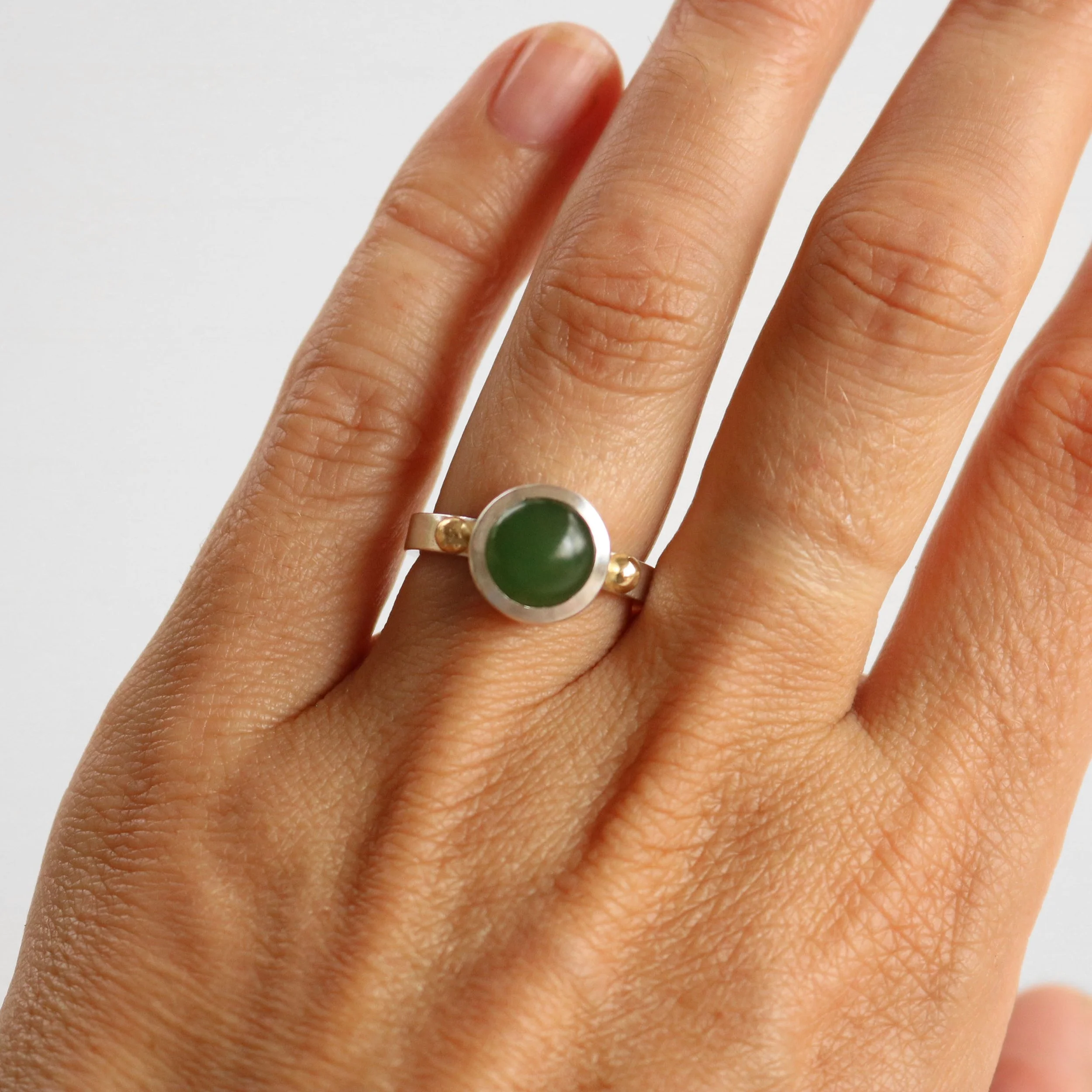 Round pounamu silver 18ct gold ring 4.jpg