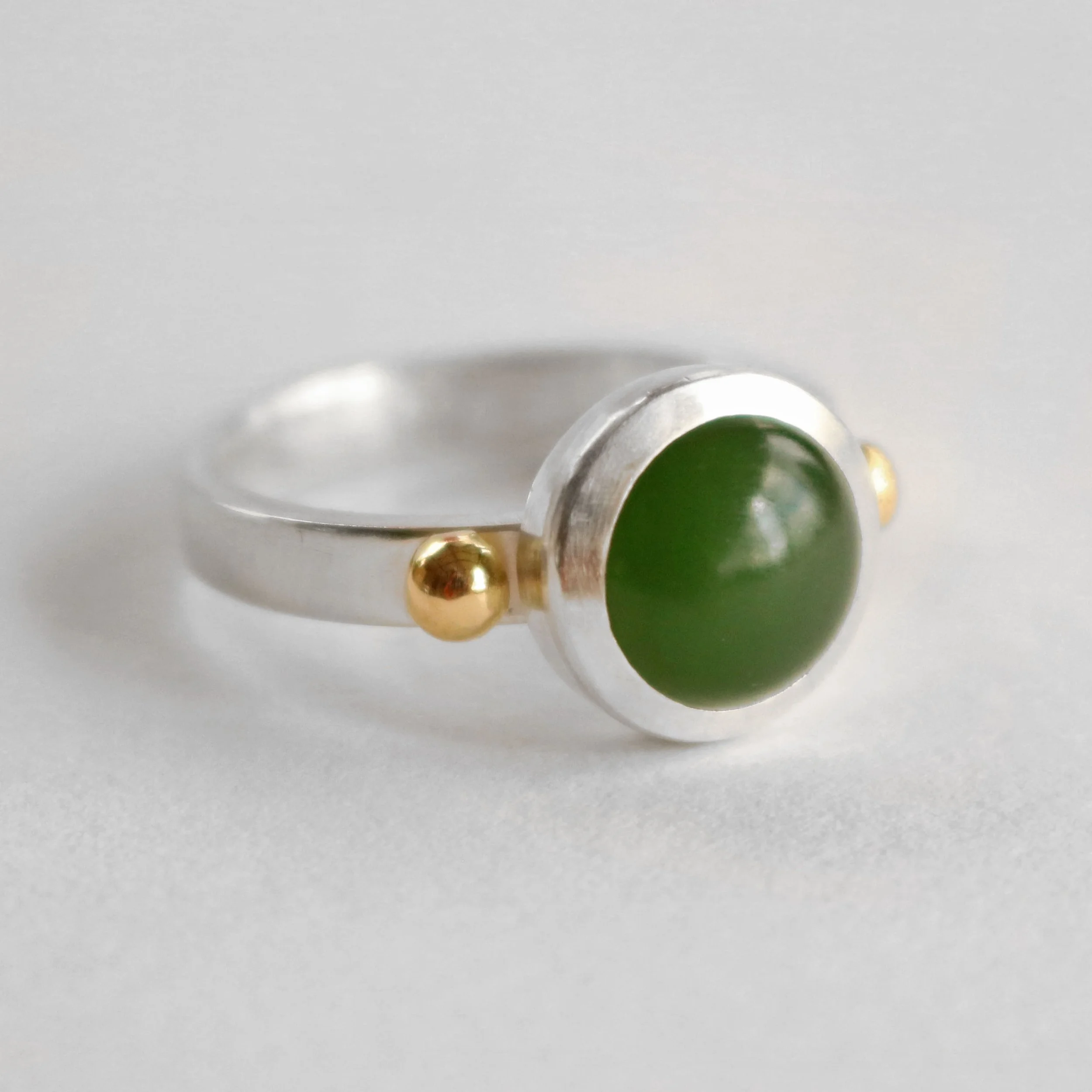 Round pounamu silver 18ct gold ring 2.jpg