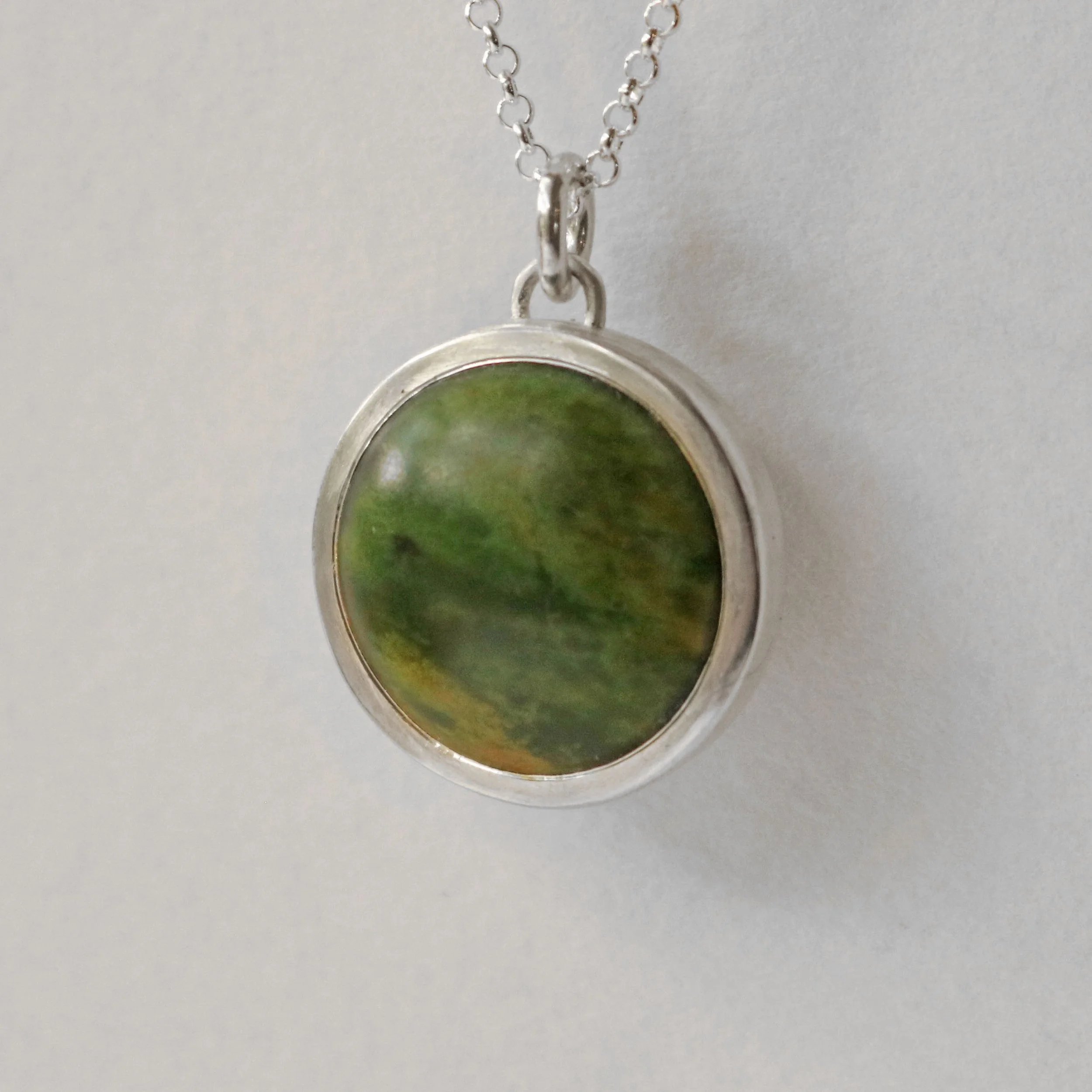Marsden Pounamu silver round pendant 3.jpg