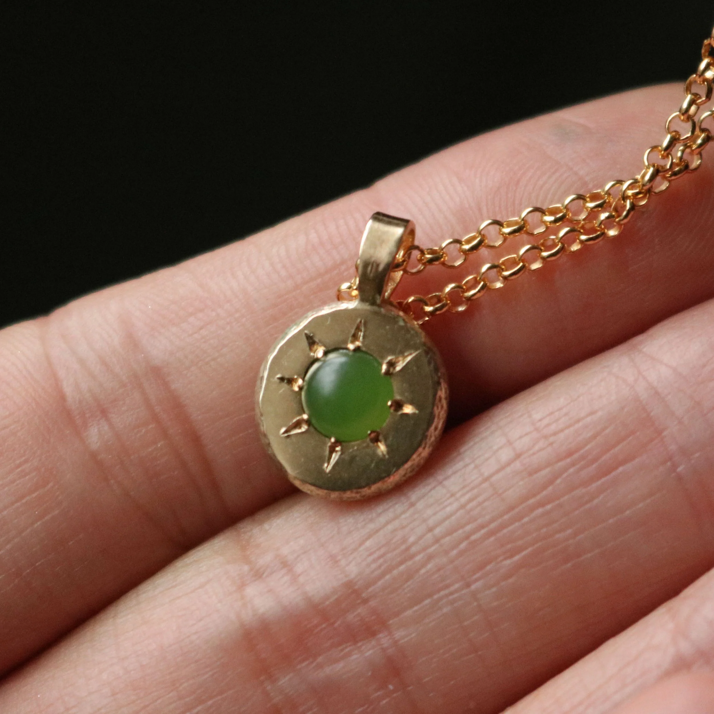 Pounamu sun pendant 3.jpg