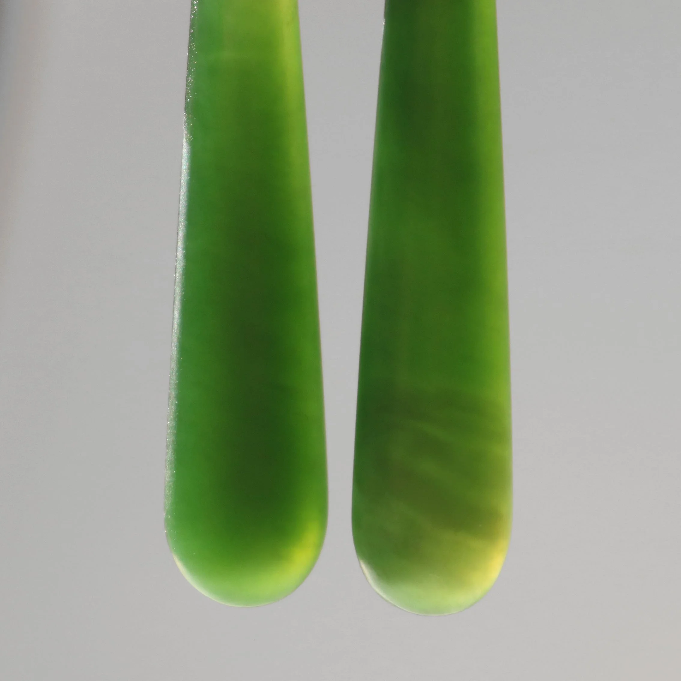 Small gold roimata earrings.jpg