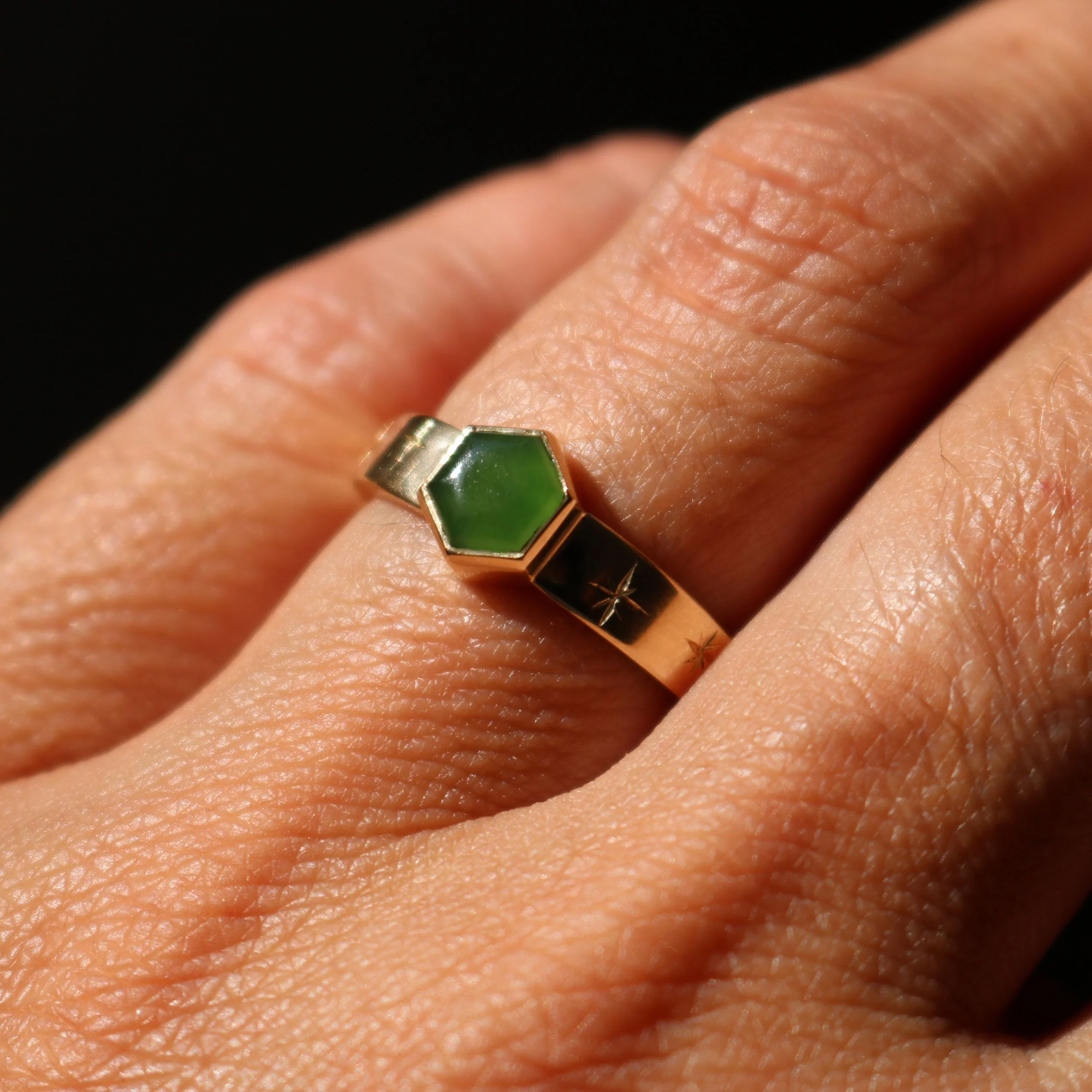 hexagon pounamu + whetu engraving 2026.jpg