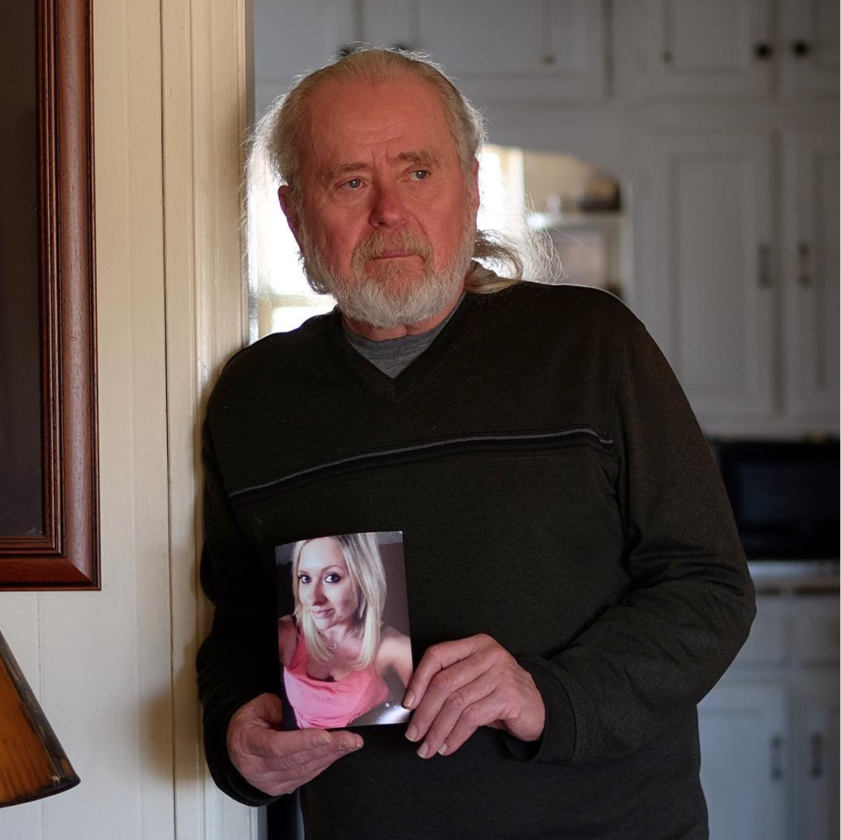  Odessa, TX.&nbsp; Jon Nielsen stands in his home in Odessa, TX, holding a photo of his daughter Monica Deming, 32. Deming was murdered last November by her ex-boyfriend Brandon Leyva, who stalked and harassed her daily after they broke up, (the most