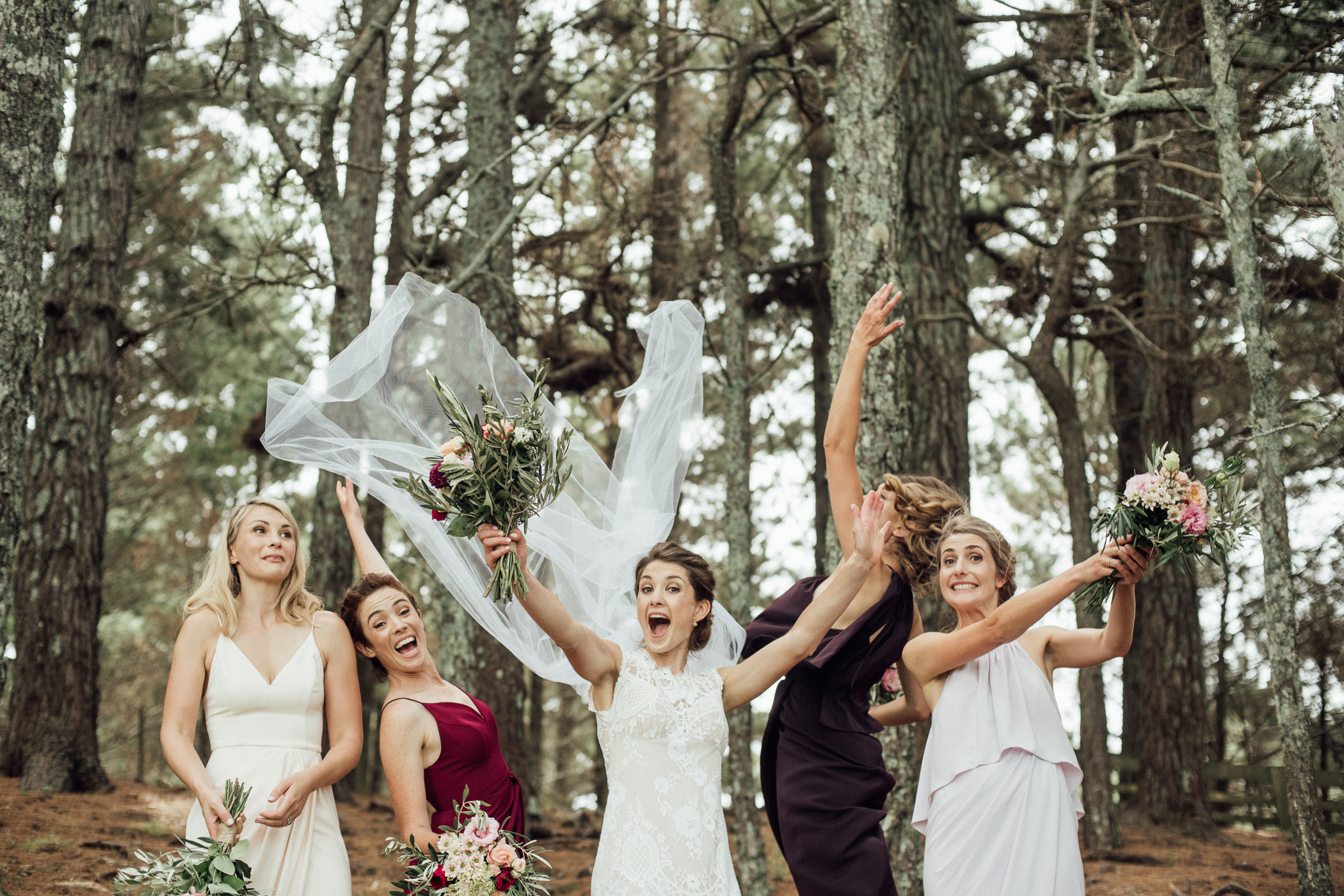 Wedding photography bridesmaids celebration veil