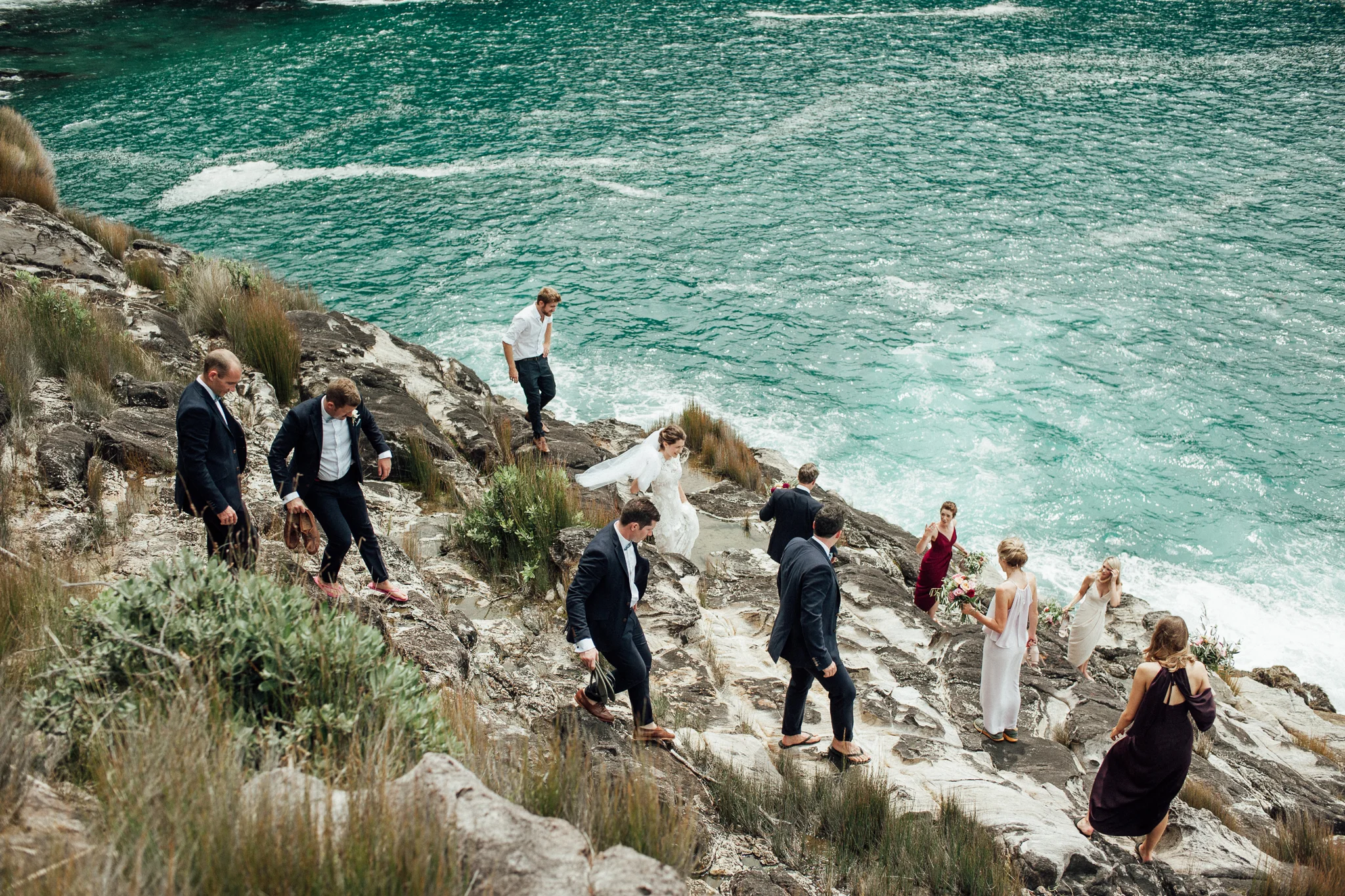adventure bridal party Wedding photography beach rocks