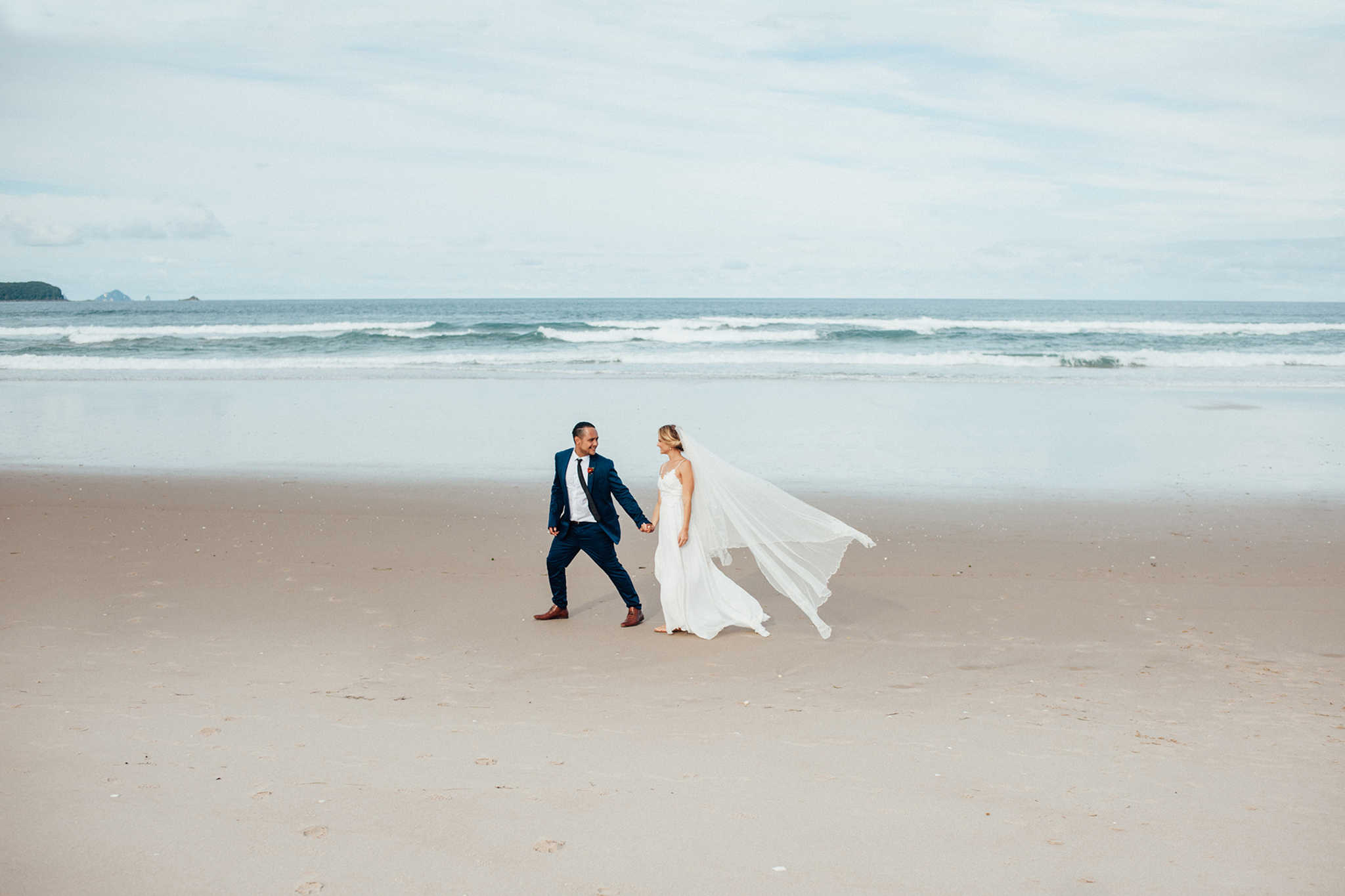 Wedding photography opoutere bride and groom beach adventure