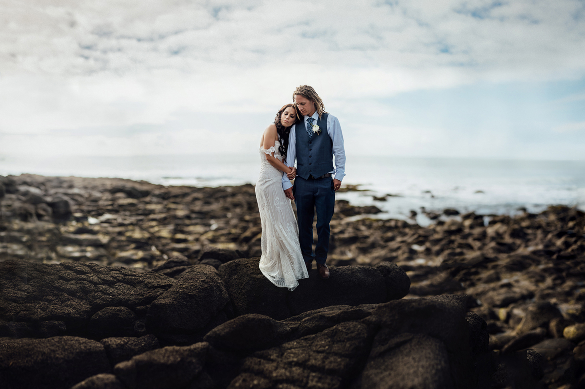 Wedding photography bride and groom beach rocks brenzier Raglan Waikato