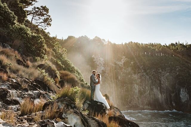 One of those epic shots on the cliff at Orua Beach House. So glad my couples will brave climbing the rocks in their wedding gears for shots like this. Thank you all!!