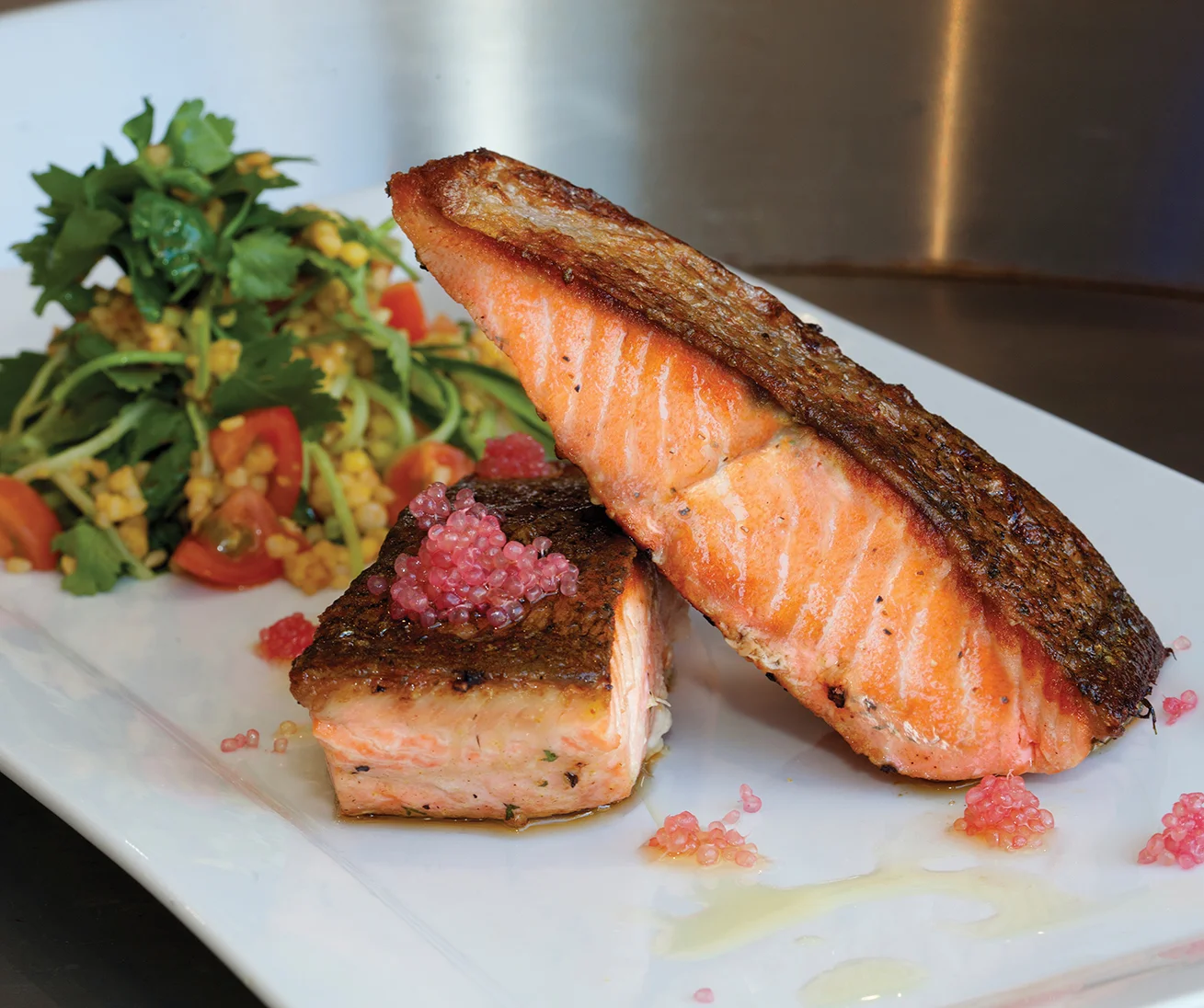Pan-fried salmon and finger limes