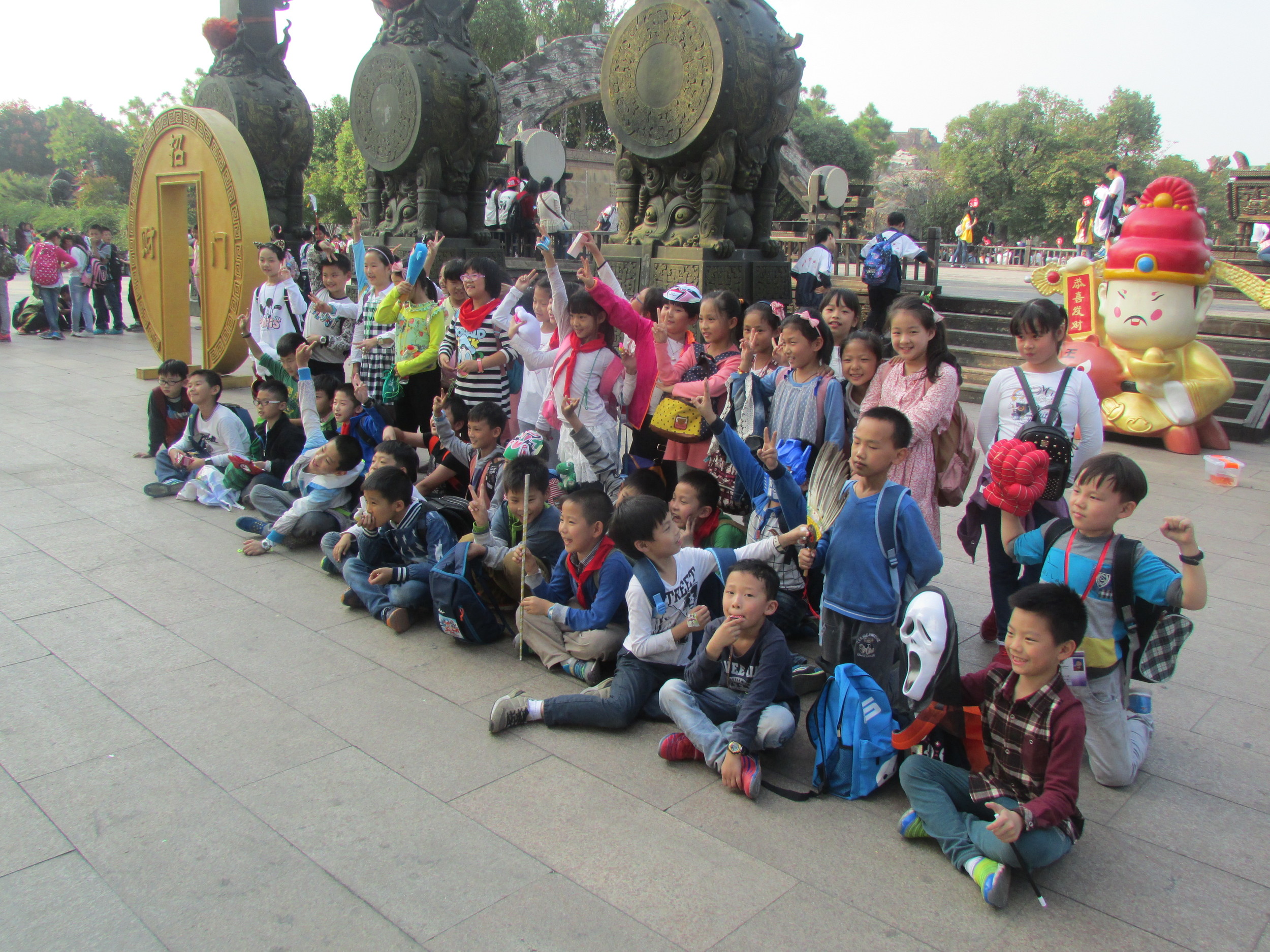 After a long day in the Yancheng theme park, my class 2 students ham it up for a group picture.