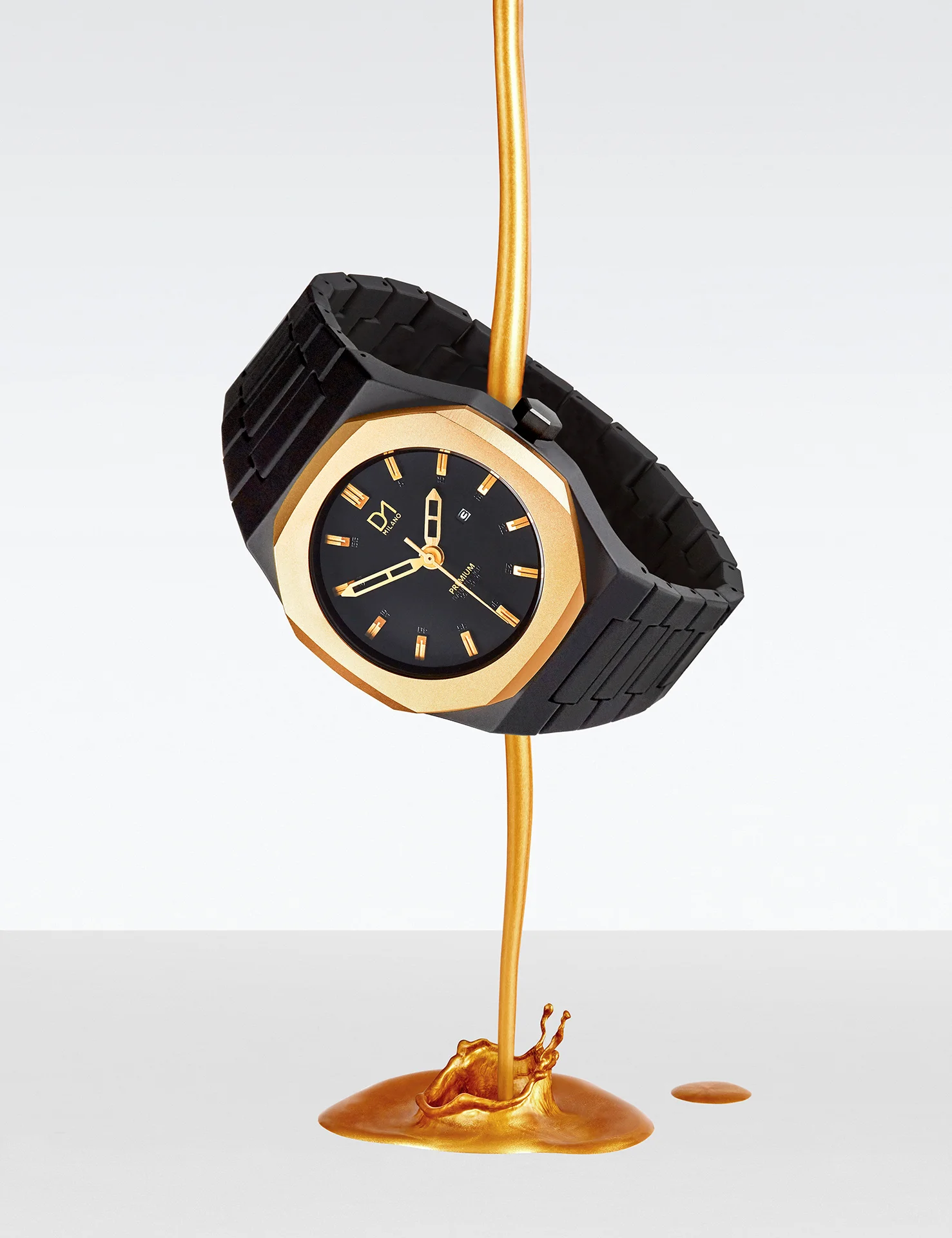  Gold D1 Milano watch shot for Streets Magazine. Luxurious watch with gold dripping paint. Creative editorial photography by luxury goods photographer Josh Caudwell. 