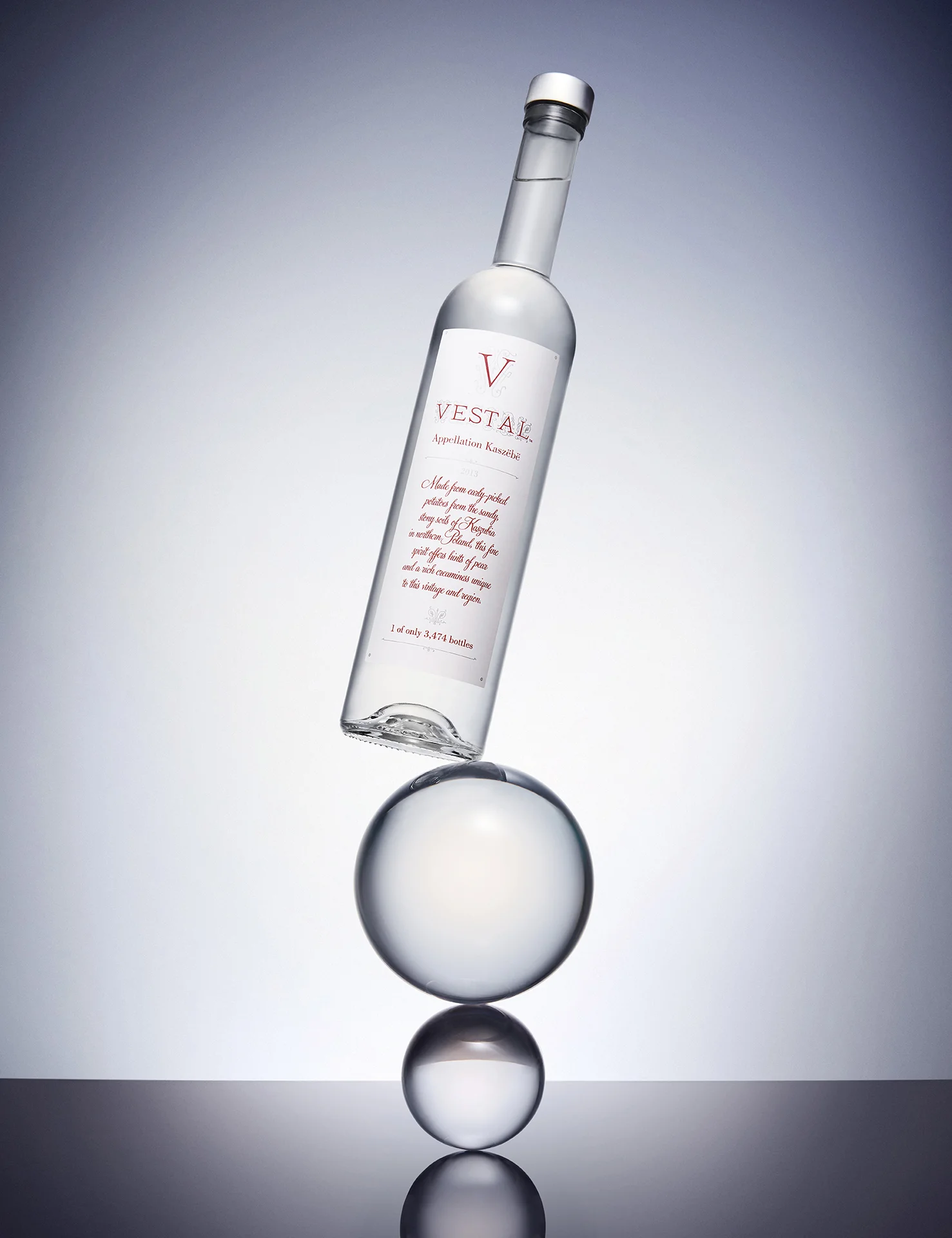  Vestal Vodka, shot by London based still life photographer Josh Caudwell. Vodka balancing on glass balls. Product photography of drinks by creative still life photographer for beverages, drinks and alcohol in London, NYC and Paris. 