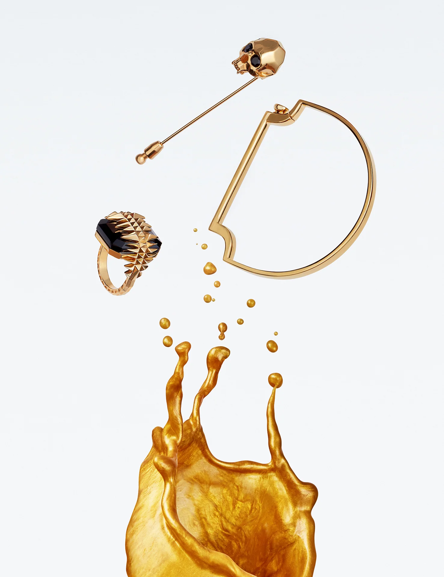  Still life photographer in London, Josh Caudwell, shoots luxury golden jewellery still life image with liquid gold.&nbsp;Creative photographer working in London, New York, Paris and Milan. For fashion still life, product photography and editorial co