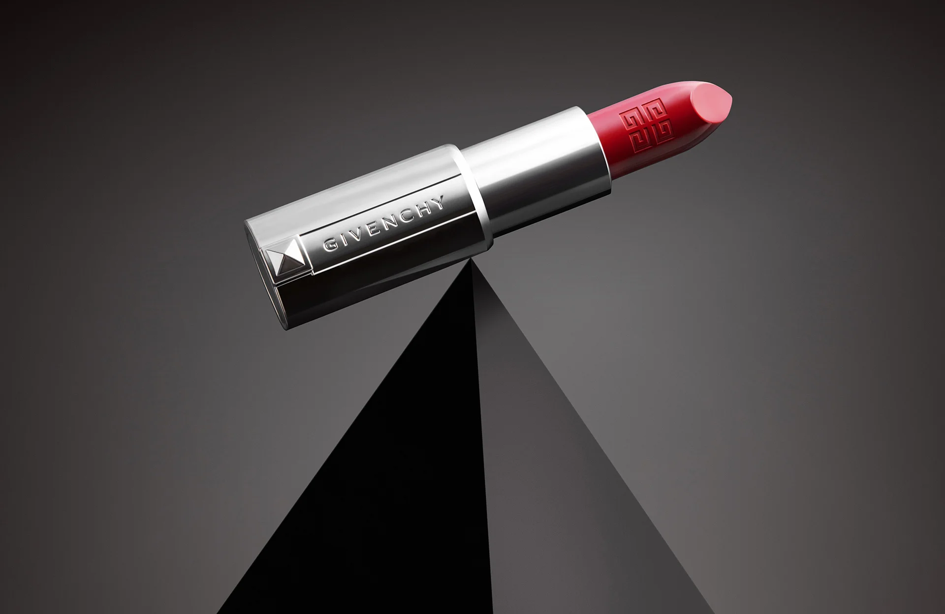  Givenchy lipstick balancing on a pyramid, creative still life photography by London based product photographer Josh Caudwell. 
