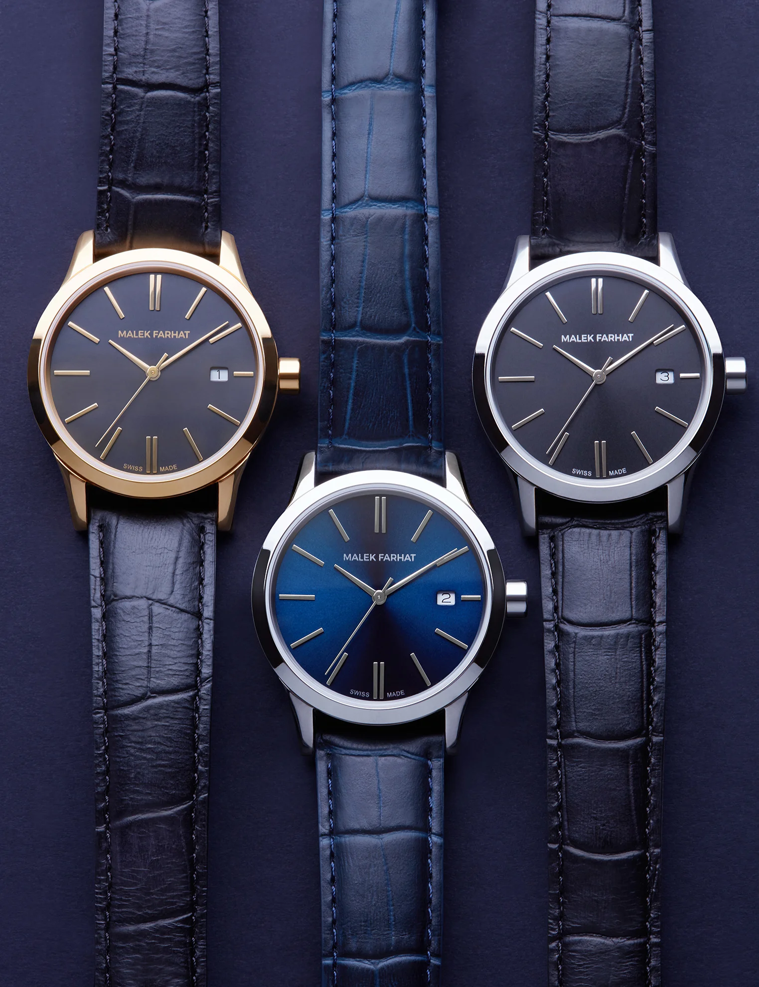  London still life watch photographer Josh Caudwell shoots watches by Malek Farhat. Blue and black faux crocodile leather straps on silver and gold luxury watches.  