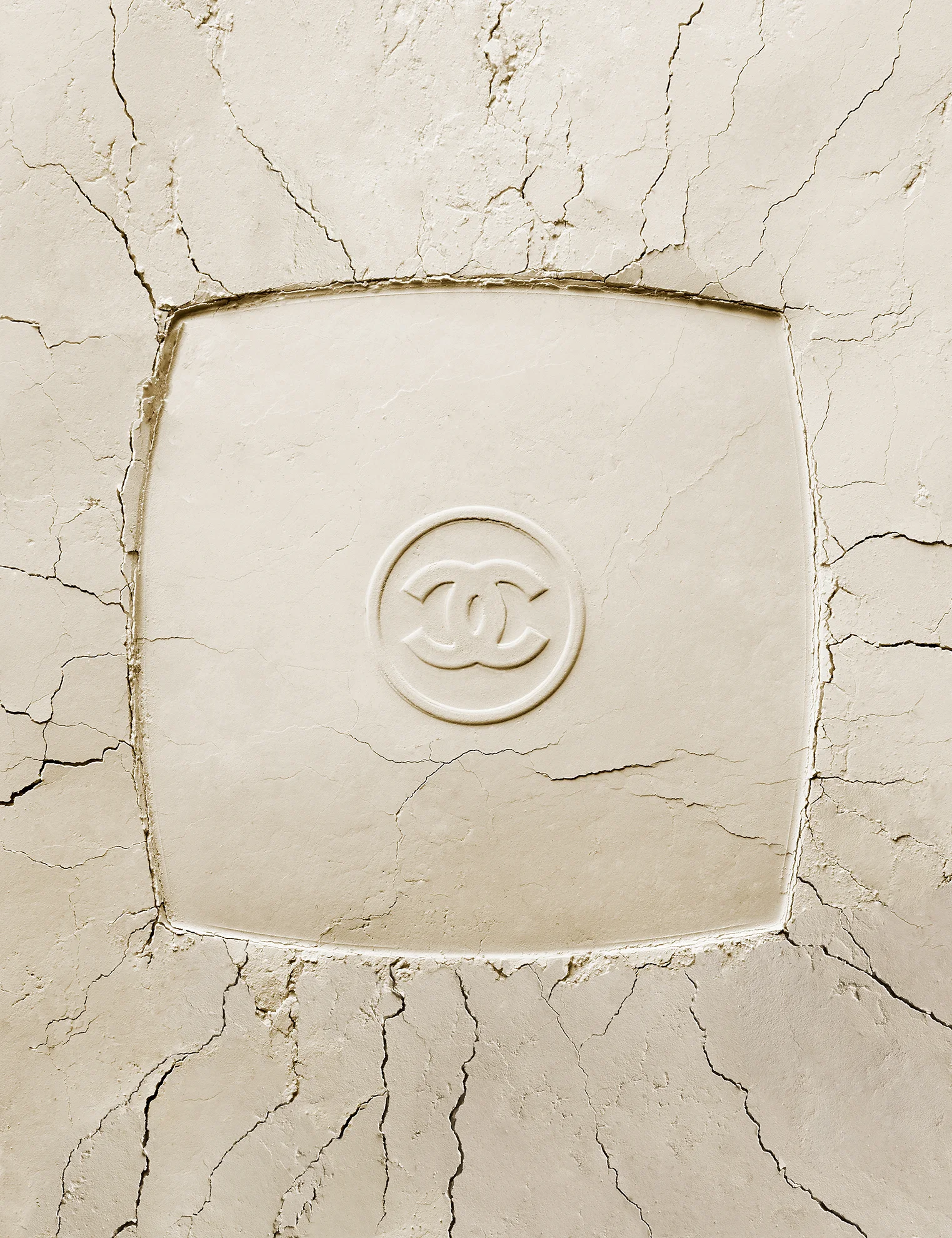  Product photography of cosmetics by still life photographer in London, Paris and New York NYC. Creative still life product photography of make up and cosmetics. Chanel make up compact in pressed powder. 