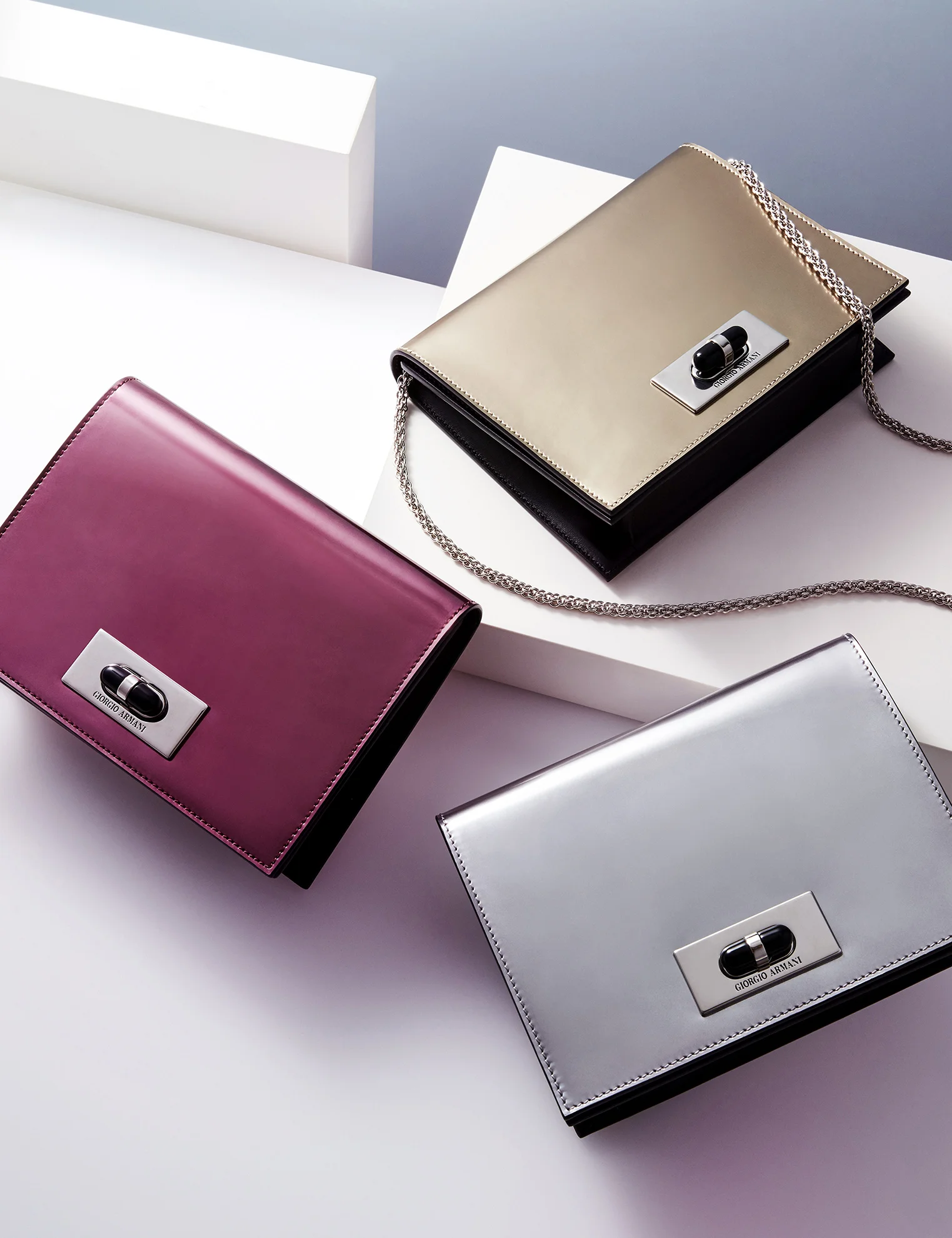  Still life photography of Armani handbags by Joshua Caudwell, still life photographer in London. Handbags photography for Vogue Magazine September issue. Metallic handbag product photography, product photographer in NYC, Paris and London. 