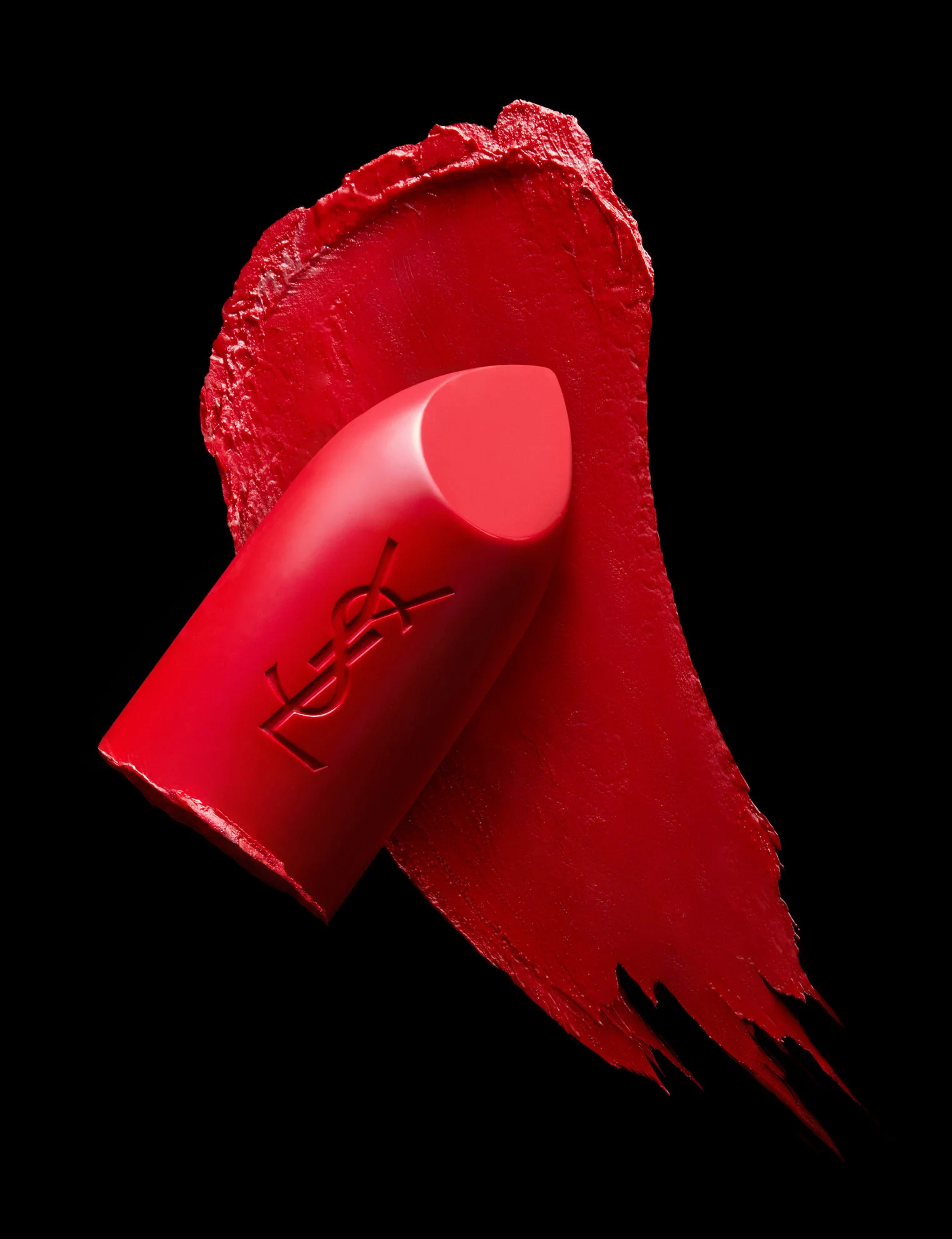  YSL lipstick swatch product photography shot by Josh Caudwell, still life photographer in London, Paris and NYC. Creative fashion still life photography. Red lipstick Yves Saint Laurent make up photography shot by creative product photographer in Lo