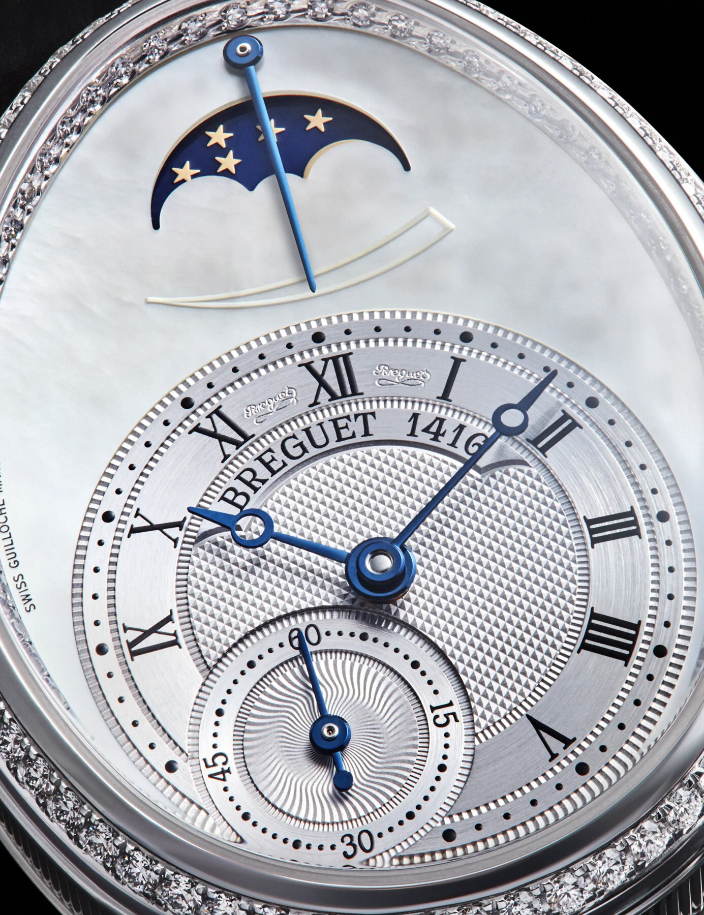  Breguet watch luxury product photography. Photo of Breguet watch face super close up. Mother of pearl watch face and detailed sub dials on a luxury watch. Still life photographer based in London and working in New York, Paris, LA and internationally