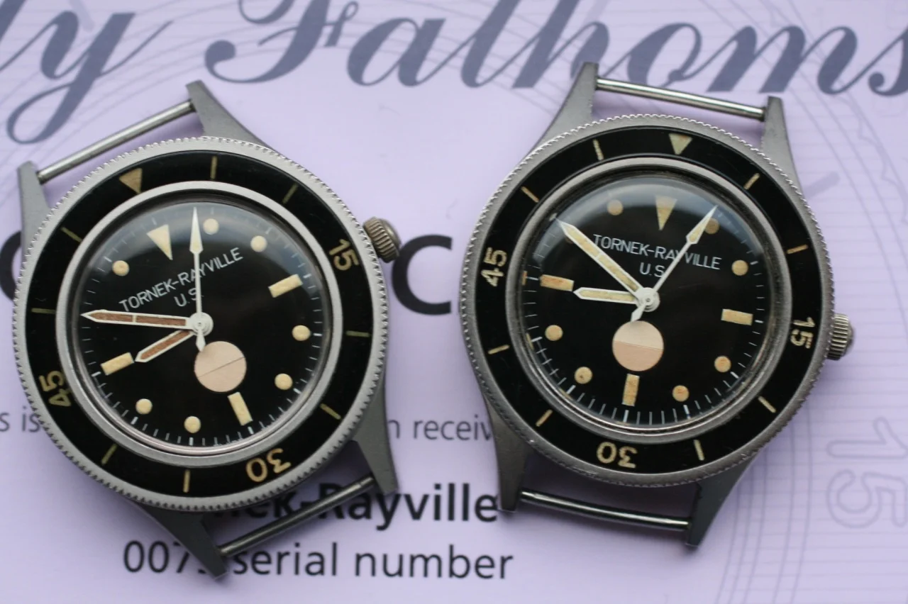 Two U.S. Navy 'tornek-rayville' Fifty fathoms. the large circular disc at 6 o'clock is a humidity detector which could alert the wearer to leakage.