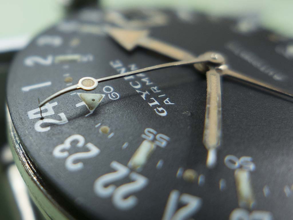 The small wire that holds the seconds hand back is visible on the hand side of the picture. Photo courtesy of The Watch Bloke.