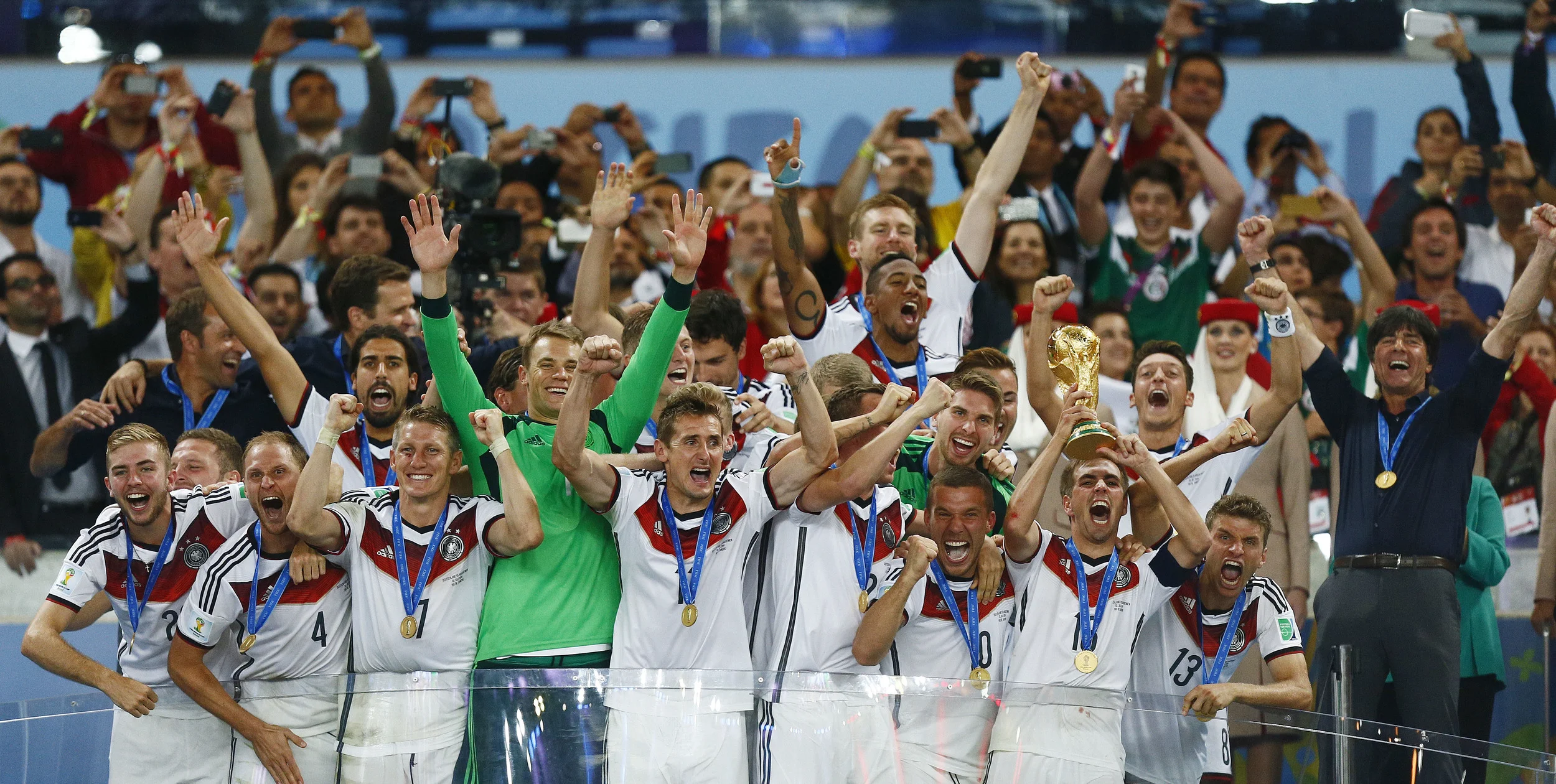 Philipp Lahm hoists the FIFA World Cup trophy after Germany beat Argentina 1-0 after extra time in the 2014 FIFA World Cup in Brazil. Germany were undefeated throughout the tournament, beating Portugal 4-0 and hosts Brazil 7-1 in the process. Action…