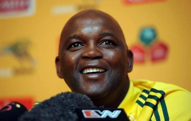 Pitso Mosimane as Bafana Bafana coach 2012. Pitso's philosophy on coaching is entrenched in youth and the future as well as helping those he cares about achieve achieve a better life for themselves and their families through sport. Image from&nbsp;w…