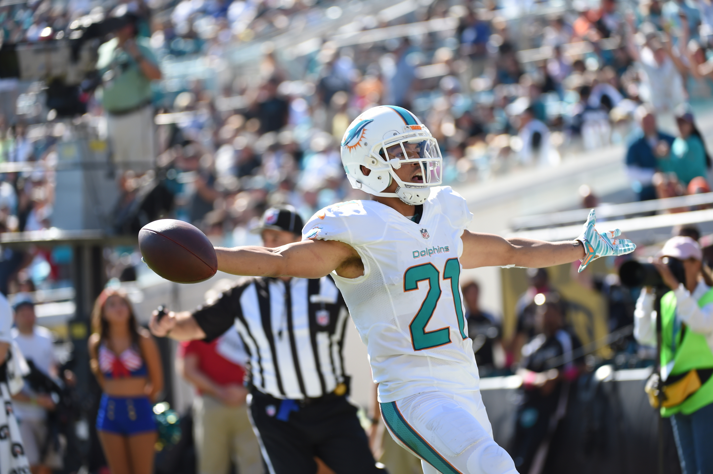 Miami Dolphins cornerback, Brent Grimes, celebrates with the crowd. The physical demands of the NFL are unique and as such Wayne Diesel, the Sports Performance Director for the Miami franchise has to adapt and draw on all his experience to ensure hi…