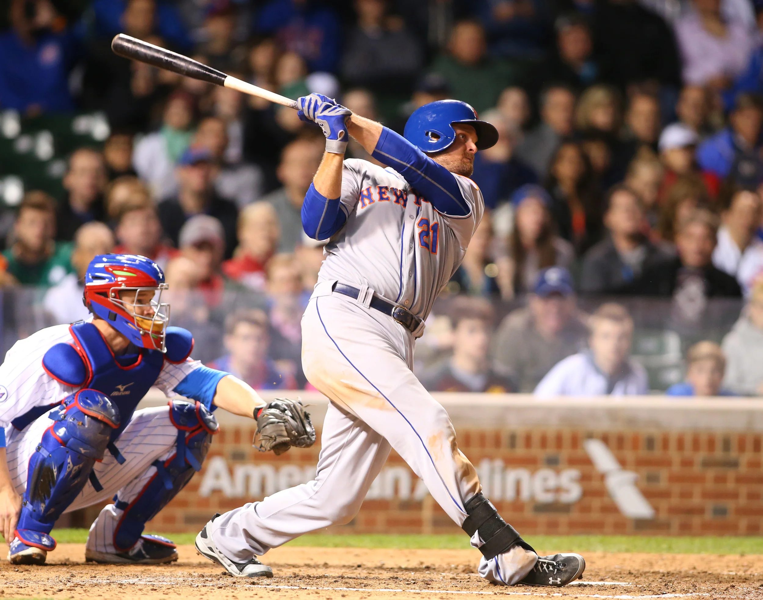 New York Mets first baseman Lucas Duda hits a home run during the sixth inning against the Chicago Cubs at Wrigley Field. Powerful hitting and the ability to clear the fences is a skill that is required in both baseball and T20 cricket. Image supplied by Action Images/ Caylor Arnold-USA TODAY Sports