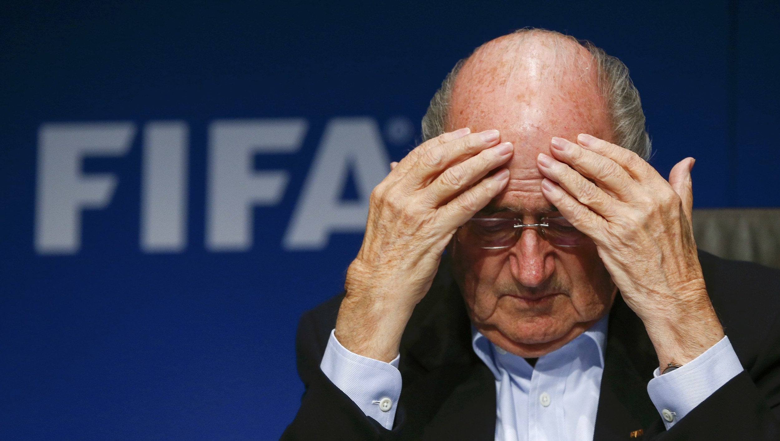 Suspended president of FIFA, Sepp Blatter, looks dejected as he faces journalists at a news conference in September 2014. The disgraced Swiss is facing a life ban from football after a series of corruption allegations, most notably, money laundering related to the allocation of the 2018 and 2022 FIFA soccer World Cups in Russia and Qatar. Image supplied by Action Images / Arnd Wiegmann.