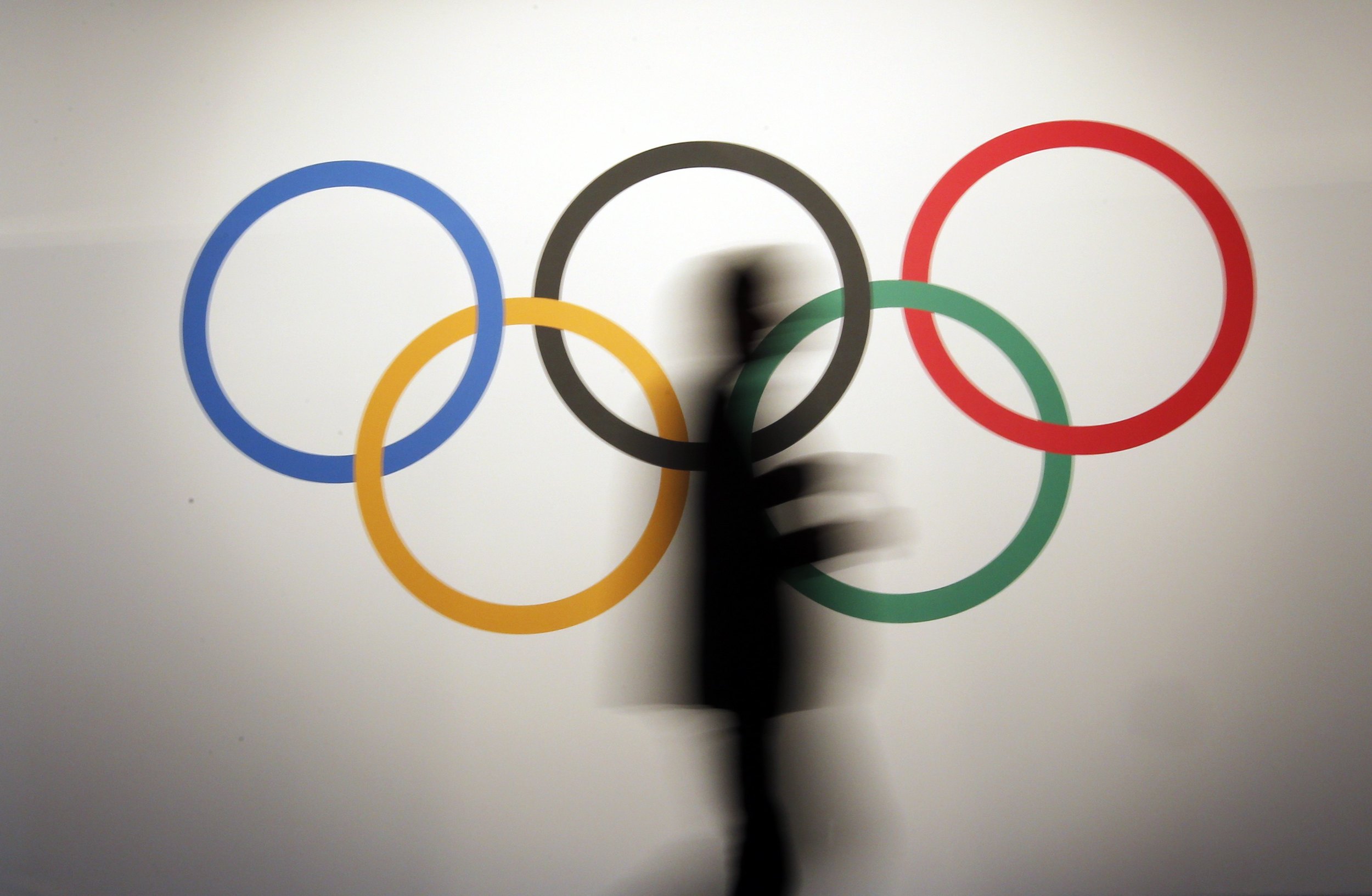 A man walks past the 5 Olympic Rings. These rings, representing the 5 continents of the world, will be the symbol that Team Refugee Olympic Athletes will walk behind during the Games in Rio later this year. Image supplied by Action Images