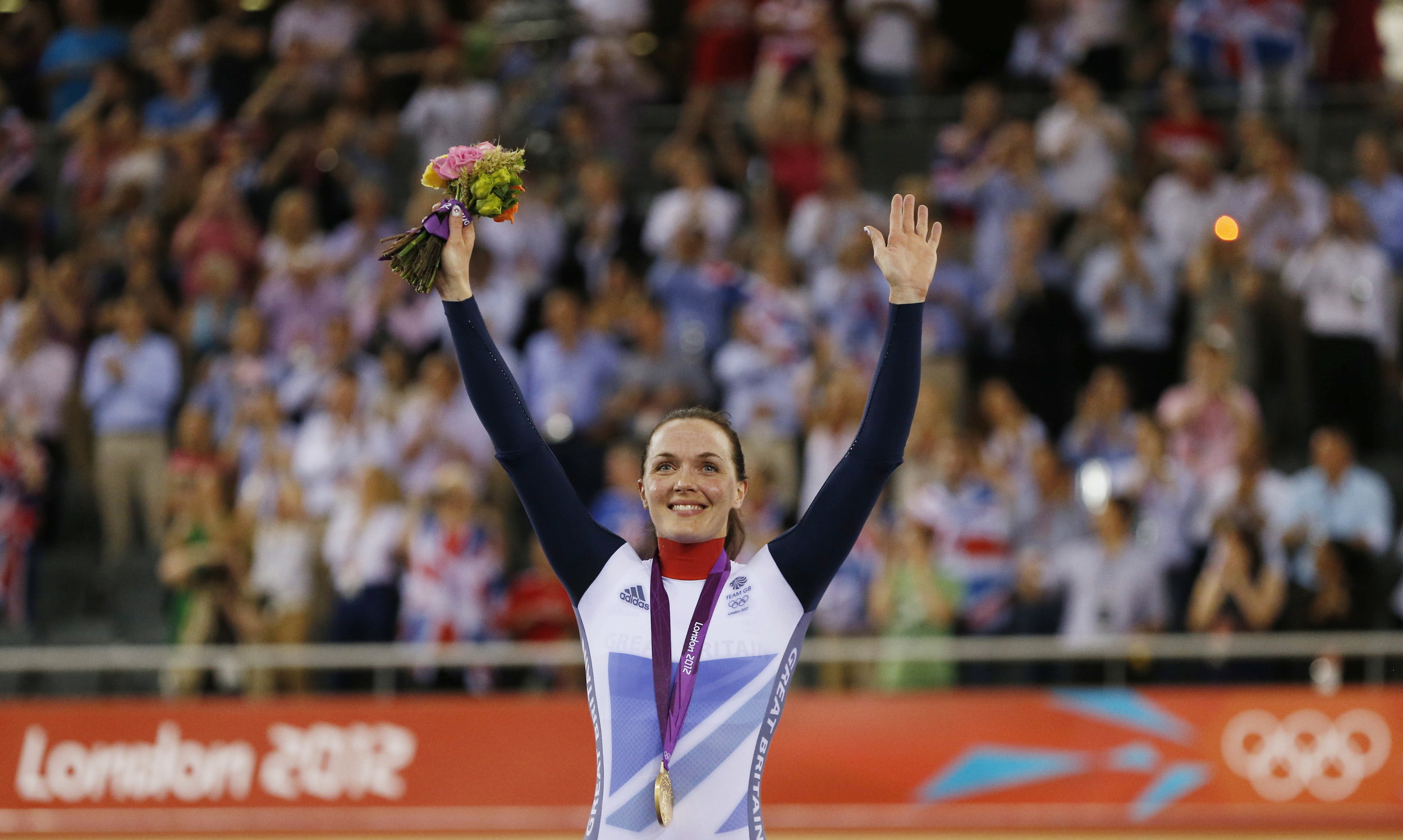 Great Britain's Victoria Pendleton celebrates winning gold in the Women's Keirin at the London 2012 Olympic Games. Image supplied by Action Images / Andrew Boyers . 