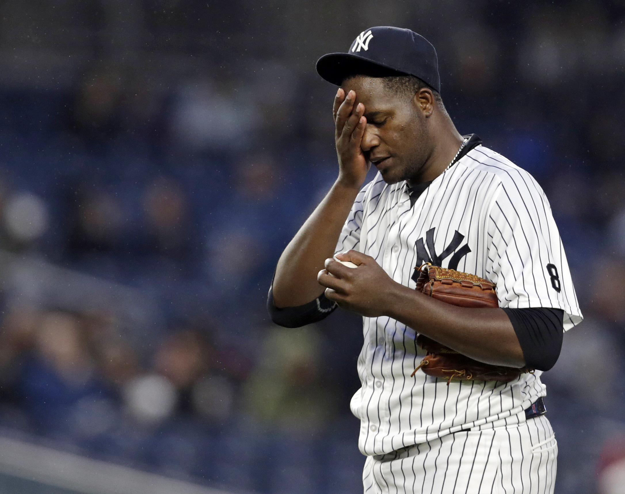 New York Yankees starting pitcher Michael Pineda (35) reacts during the second inning against the Boston Red Sox at Yankee Stadium. Image supplied by Action Images / Adam Hunger.