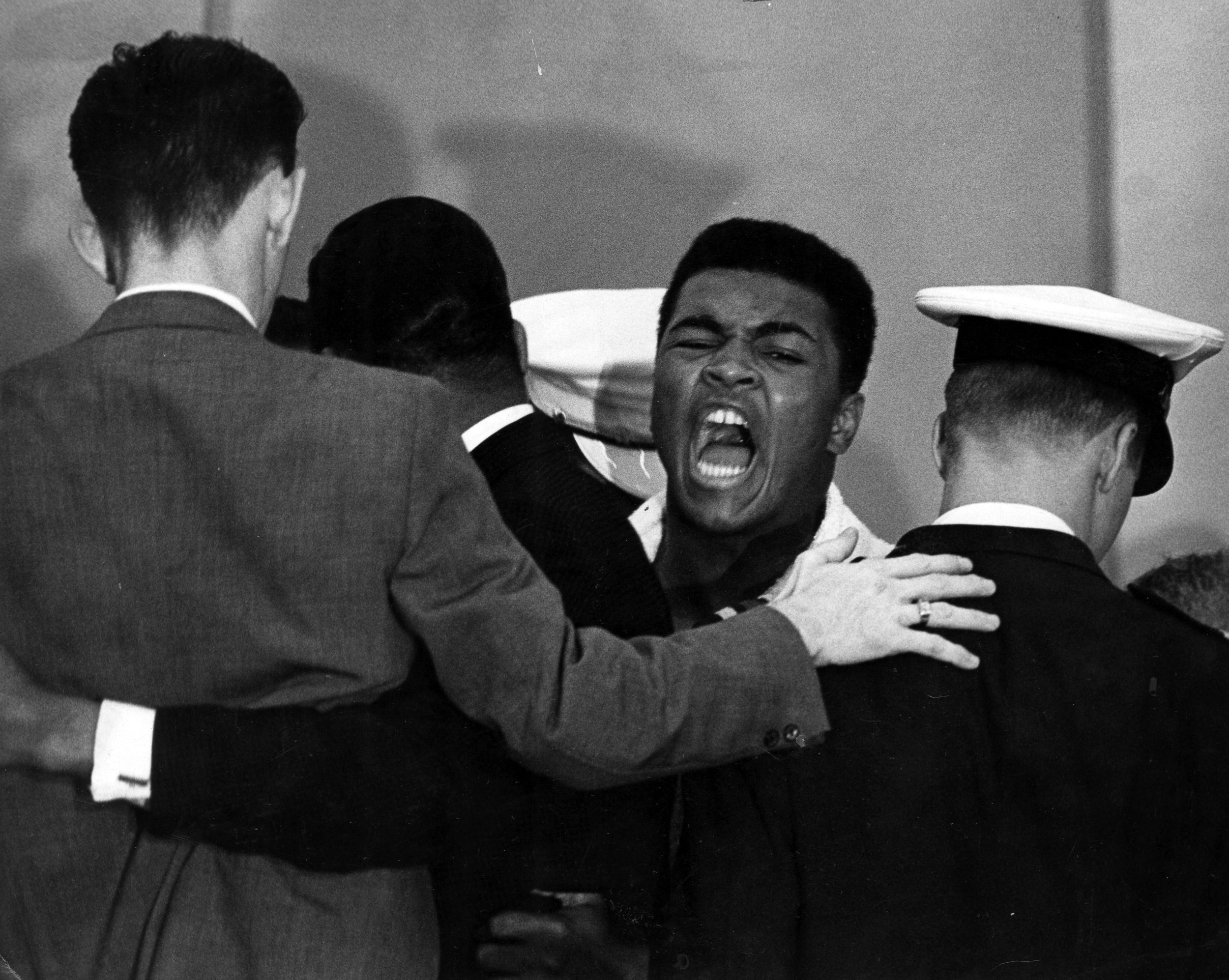 Muhammad Ali (the Cassius Clay) hours before his first title fight with Sonny Liston. Ali flew into a rage and had to be restrained by several people. Ali's trash talk was otherworldly and unrivalled. Image supplied by Action Images.