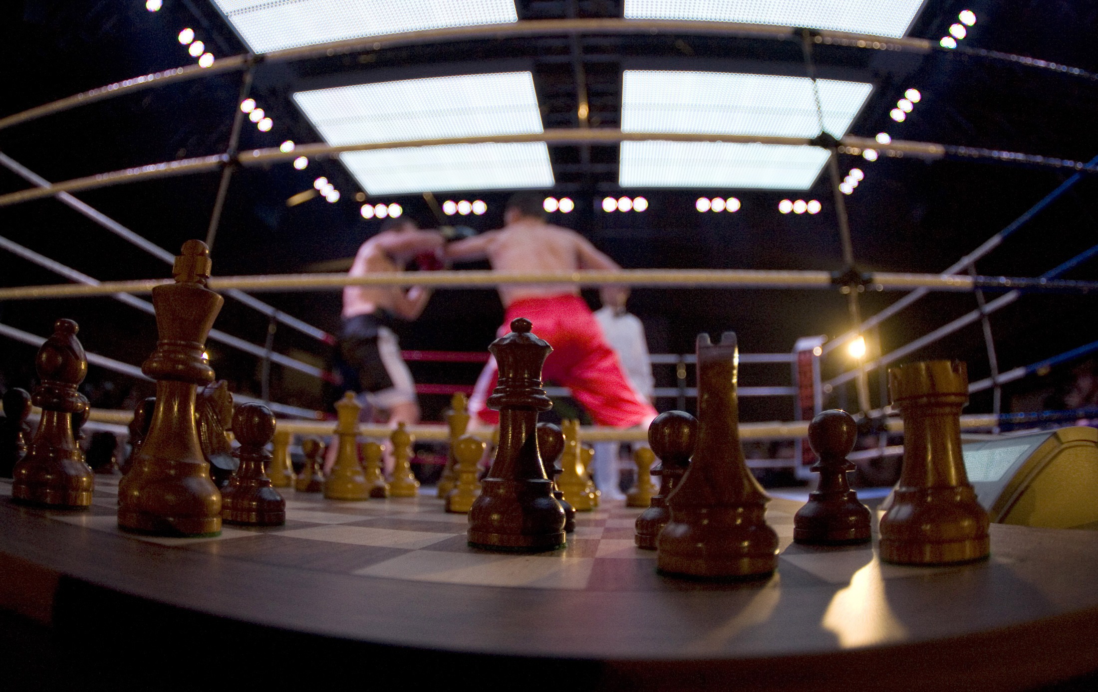 Germany's Frank Stoldt (R) delivers a punch to David Depto from the U.S. during the first chess boxing light heavyweight world championship fight in Berlin November 3, 2007. Stoldt won the competition that consists of up to 11 alternating rounds of boxing and 'blitz' chess sessions. Image supplied by Action Images / Tobias Schwarz. 