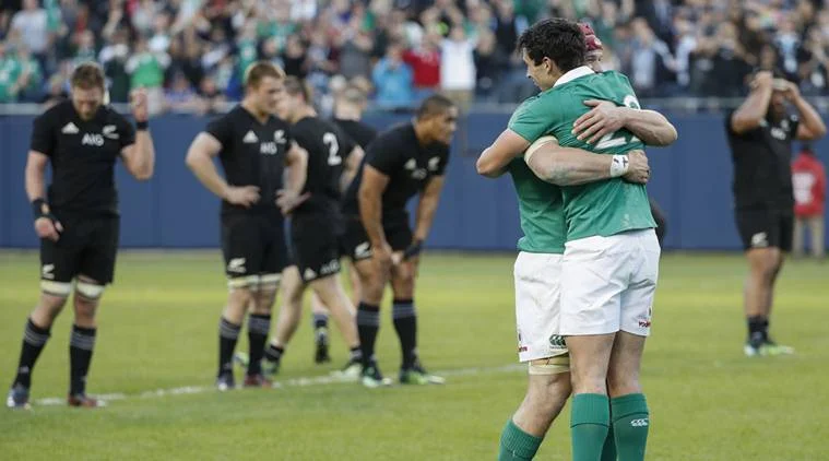 Ireland players rejoice in their first ever victory over the All Blacks in 111 years. The defeat at Soldier Field stadium, Chicago, ended a run of 18 consecutive Test victories for New Zealand. 