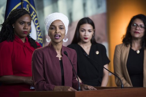 Reps. Ayanna Pressley, Ilhan Omar, Alexandria Ocasio-Cortez, and Rashida Tlaib speak with reporters during a press conference on July 15, 2019 | Tom Williams/CQ Roll Call via Getty Images