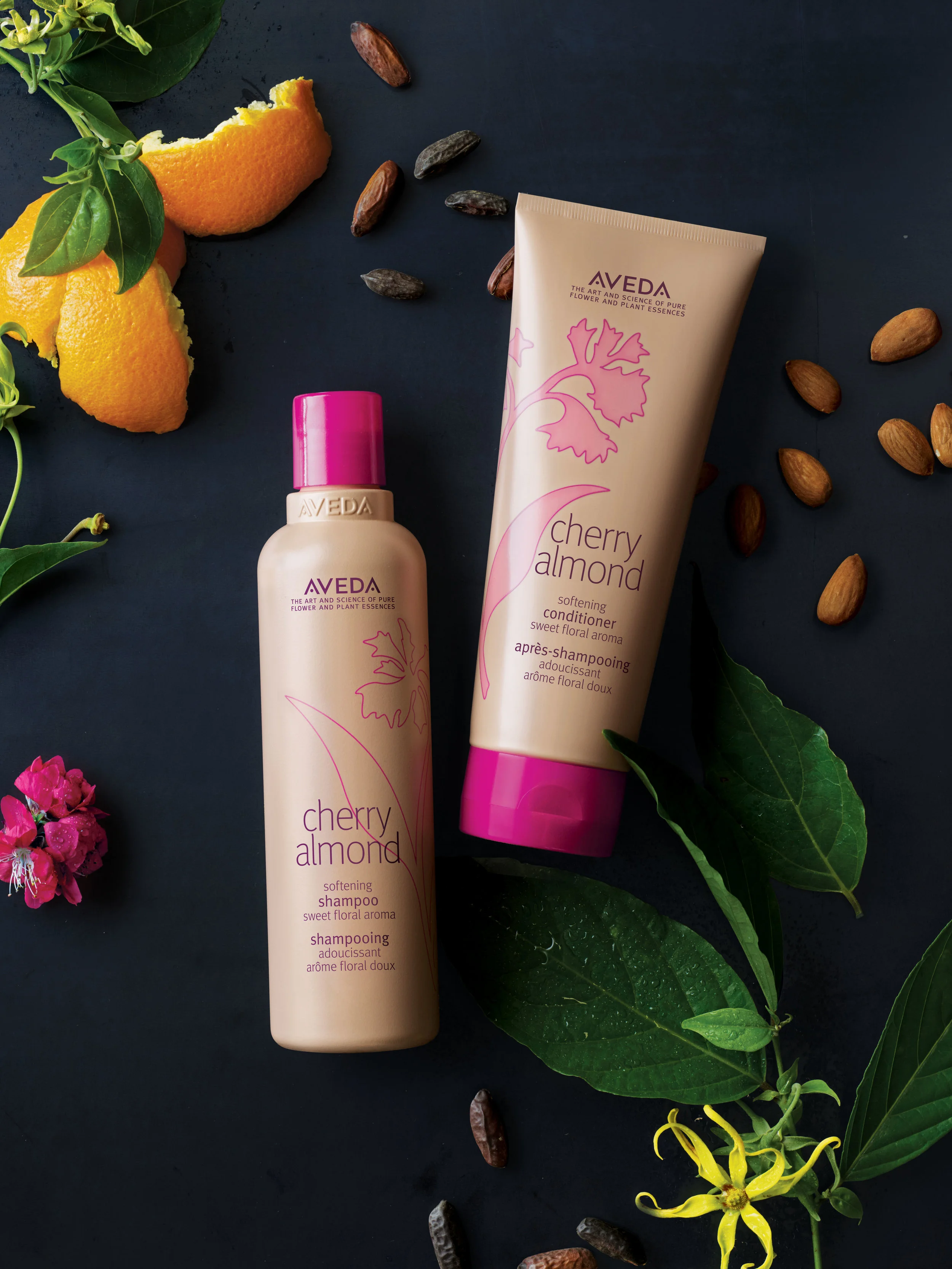 Sweet by nature, wild at heart. Cherry Almond shampoo and conditioner • 98% naturally derived • Touchably soft hair • Naturally sweet aroma