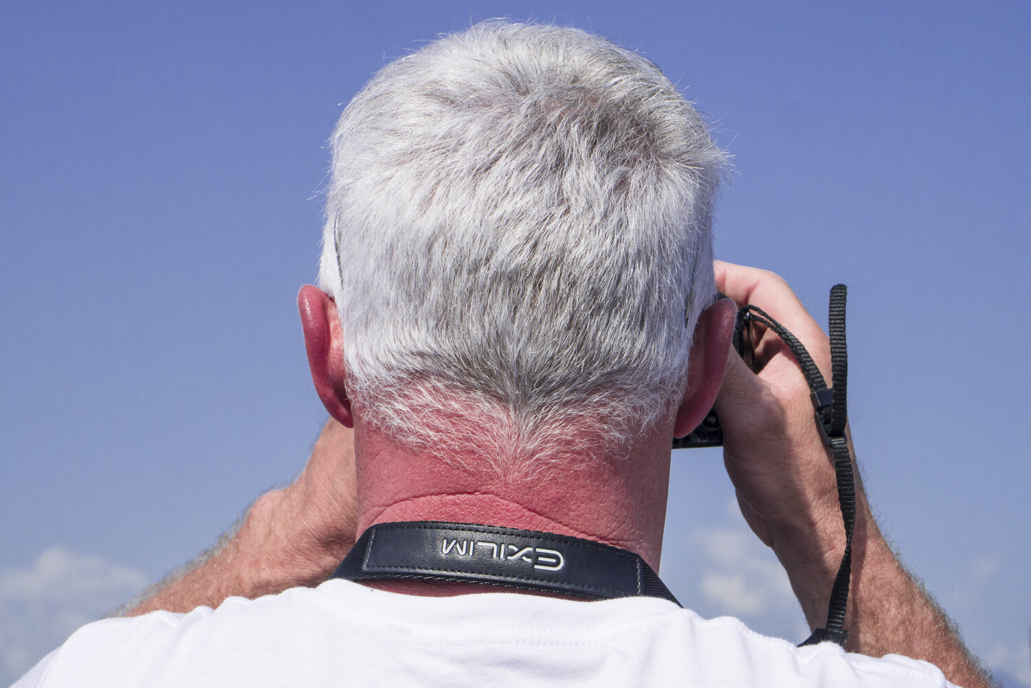 Spectateur redneck en train de photographier le meeting aérien