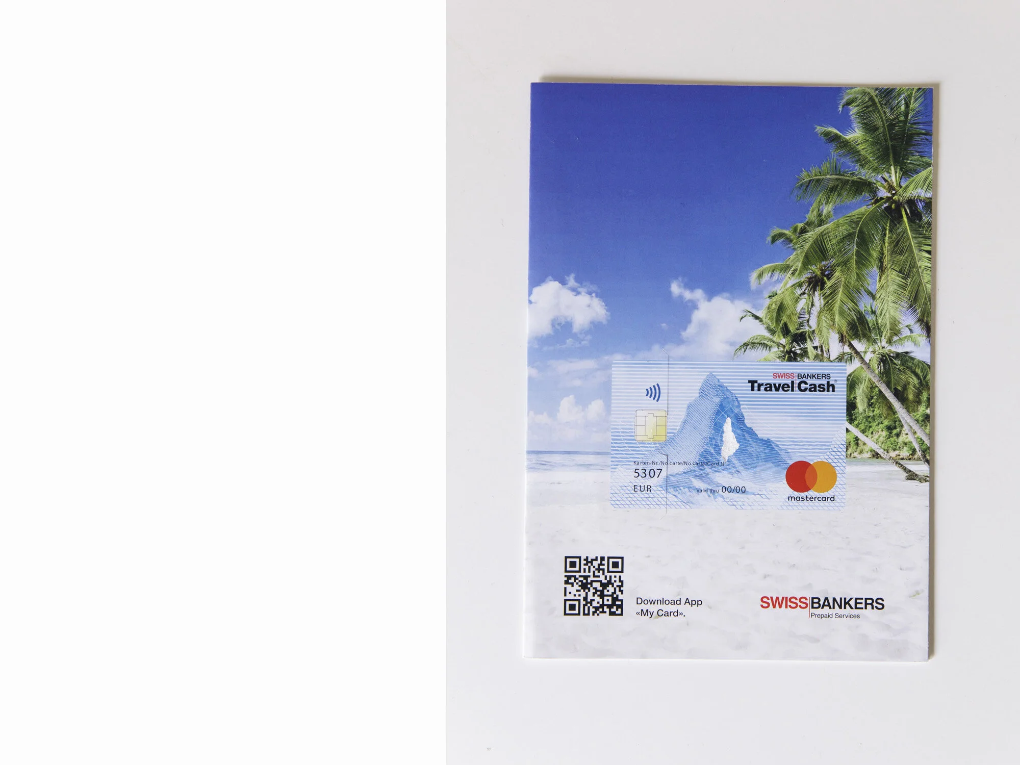 Mastercard showing the Matterhorn printed on a background made of a white sand beach and palmtrees