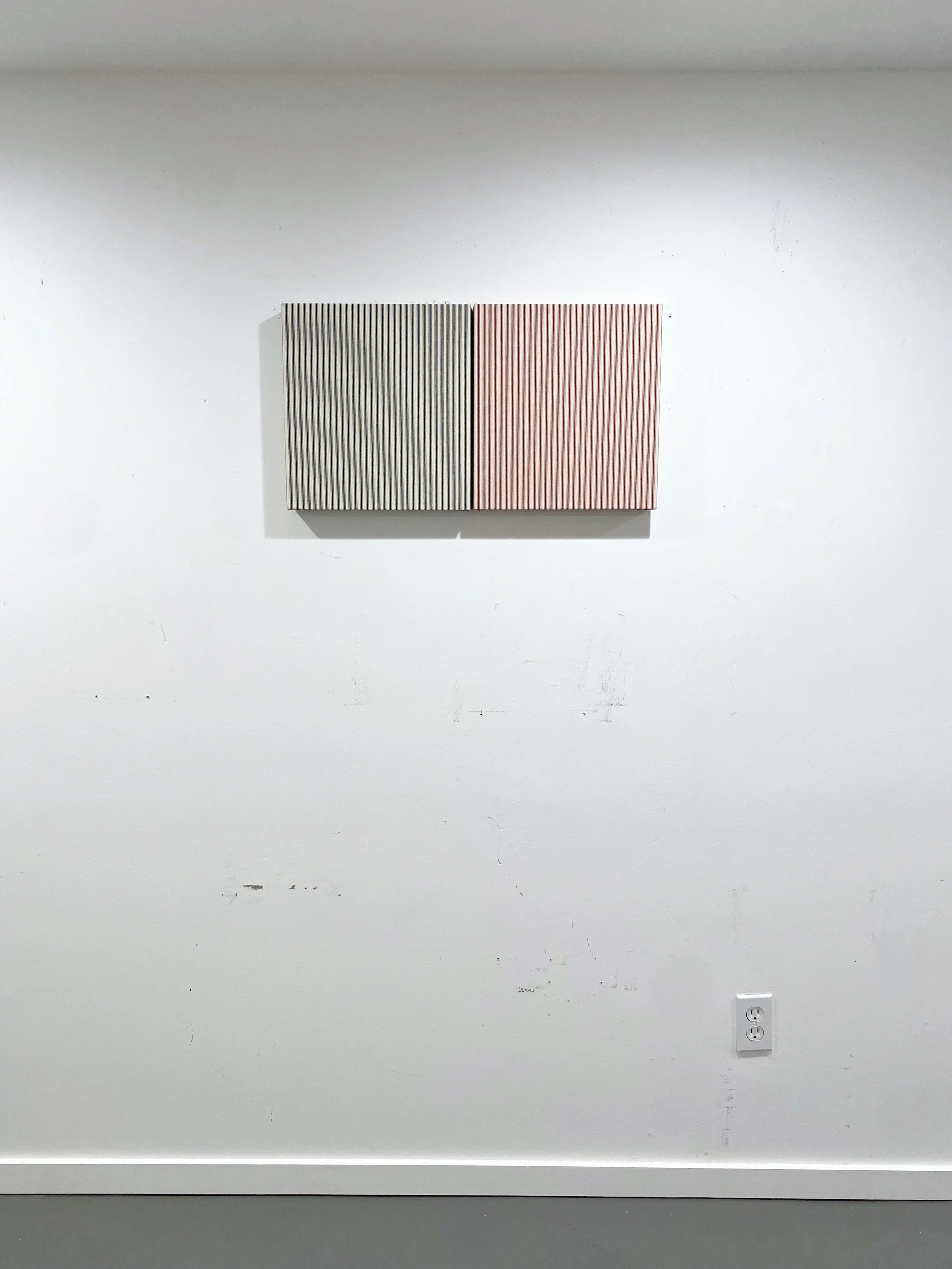   Sentimental X’s , 2025. Mattress ticking on uniquely shaped wood panel; two elements: 11 × 12 inches each. 