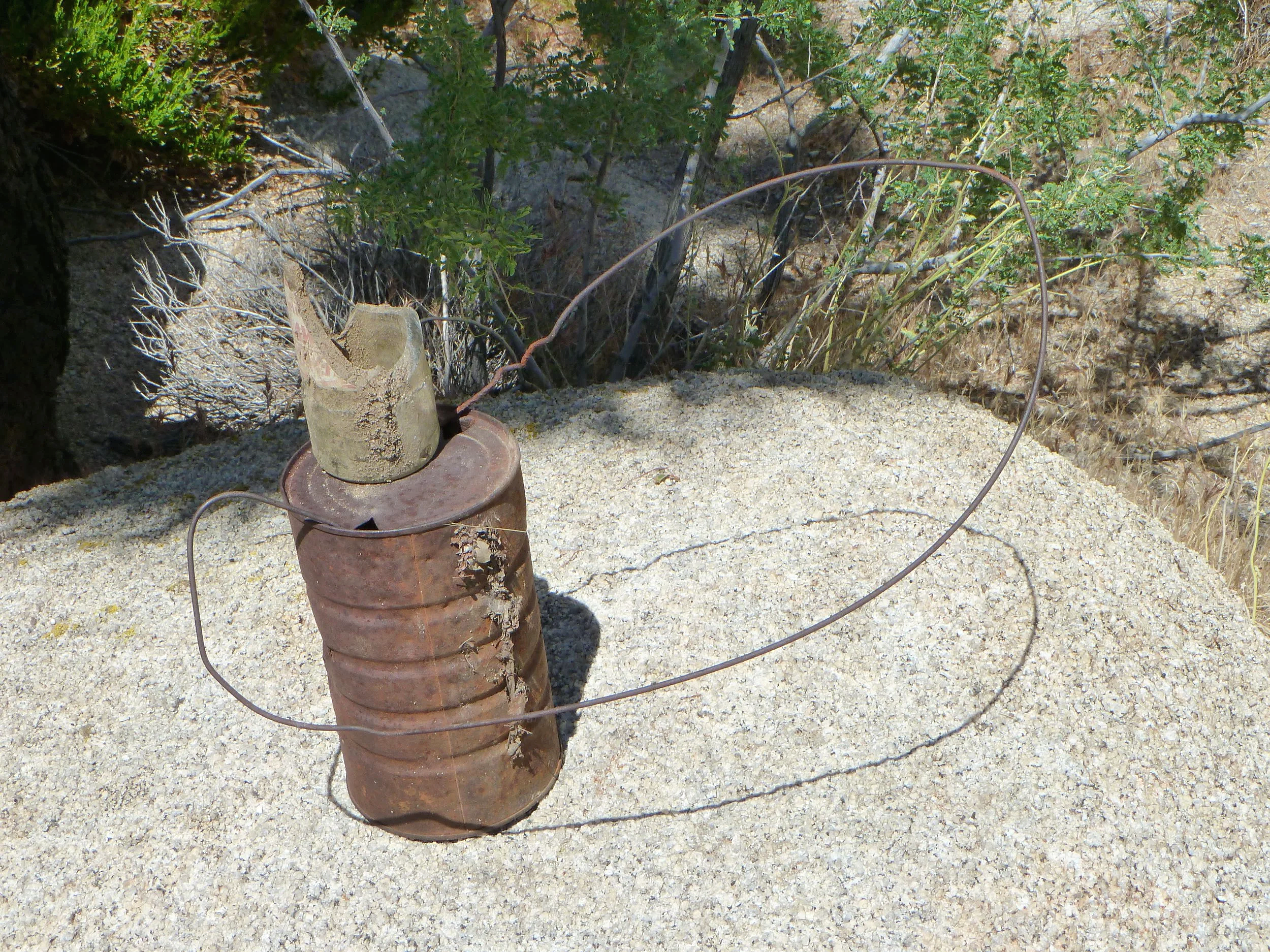   Deserted Objects , 2010. Metal and glass objects arranged on Monzogranite boulder. Mojave Desert, Joshua Tree, CA. Variable dimensions.    Deserted Objects  consists of found objects collected from California’s sunbaked Mojave Desert and arranged t
