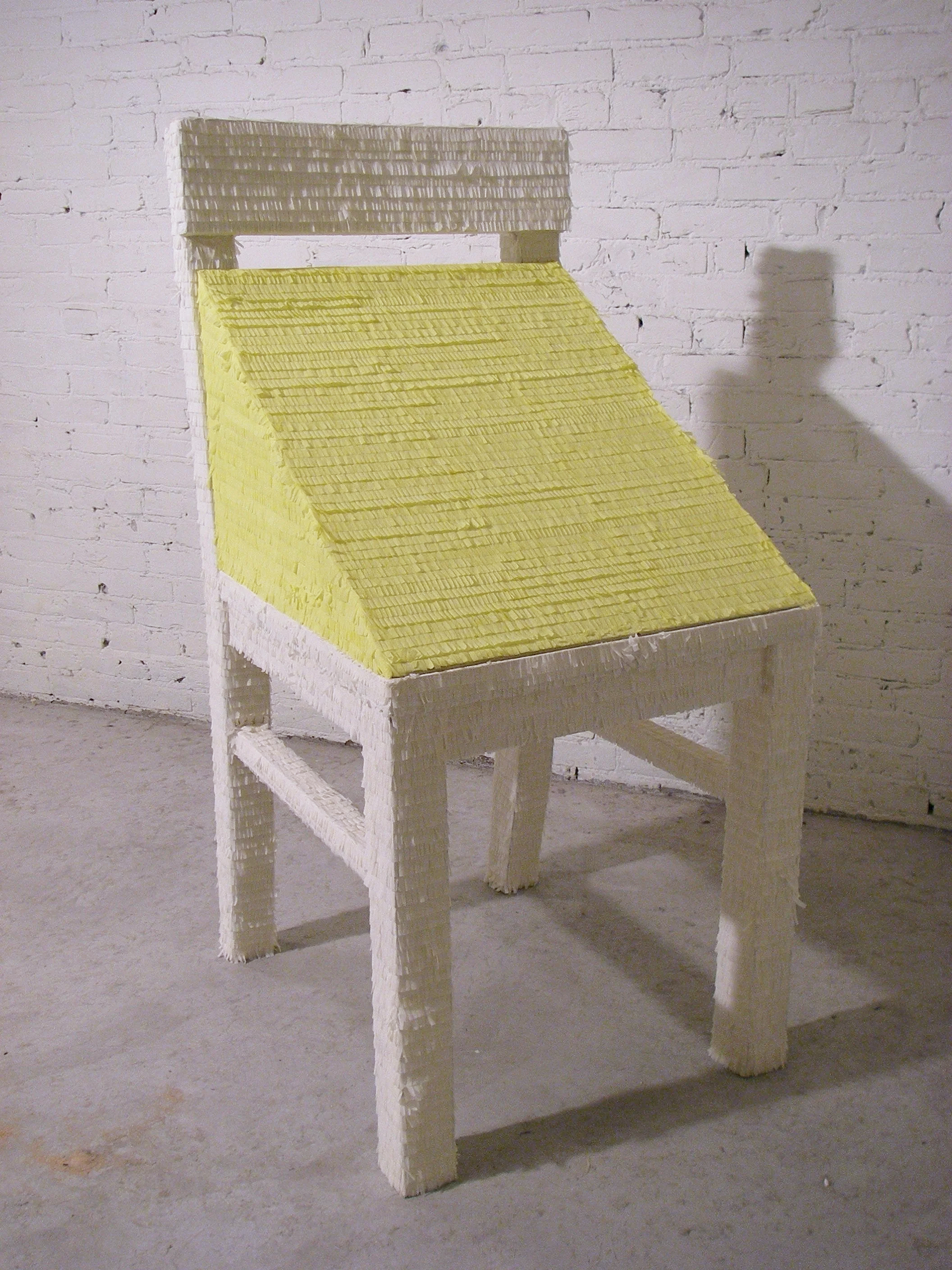   Piñata in the Vernacular of Beuys’ , 2007 (recreated 2010). Crepe paper and cardboard. Edition of 2. Snug Harbor Cultural Center, Staten Island, NY.  Inspired by Joseph Beuys’  Fat Chair  (1964), this oversized piñata translates the sculpture’s rec